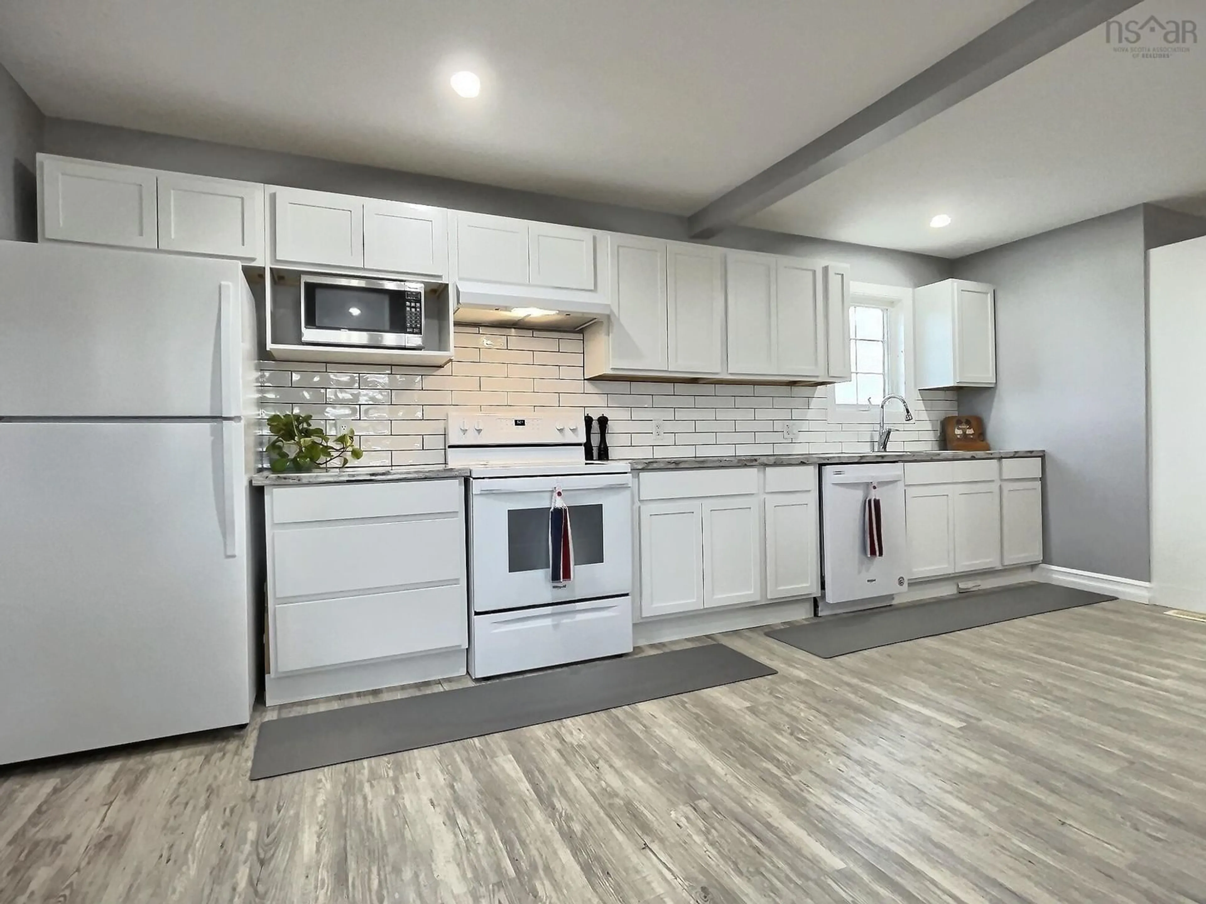 Open concept kitchen for 5 Chemin Pembroke, Grand Étang Nova Scotia B0E 1L0