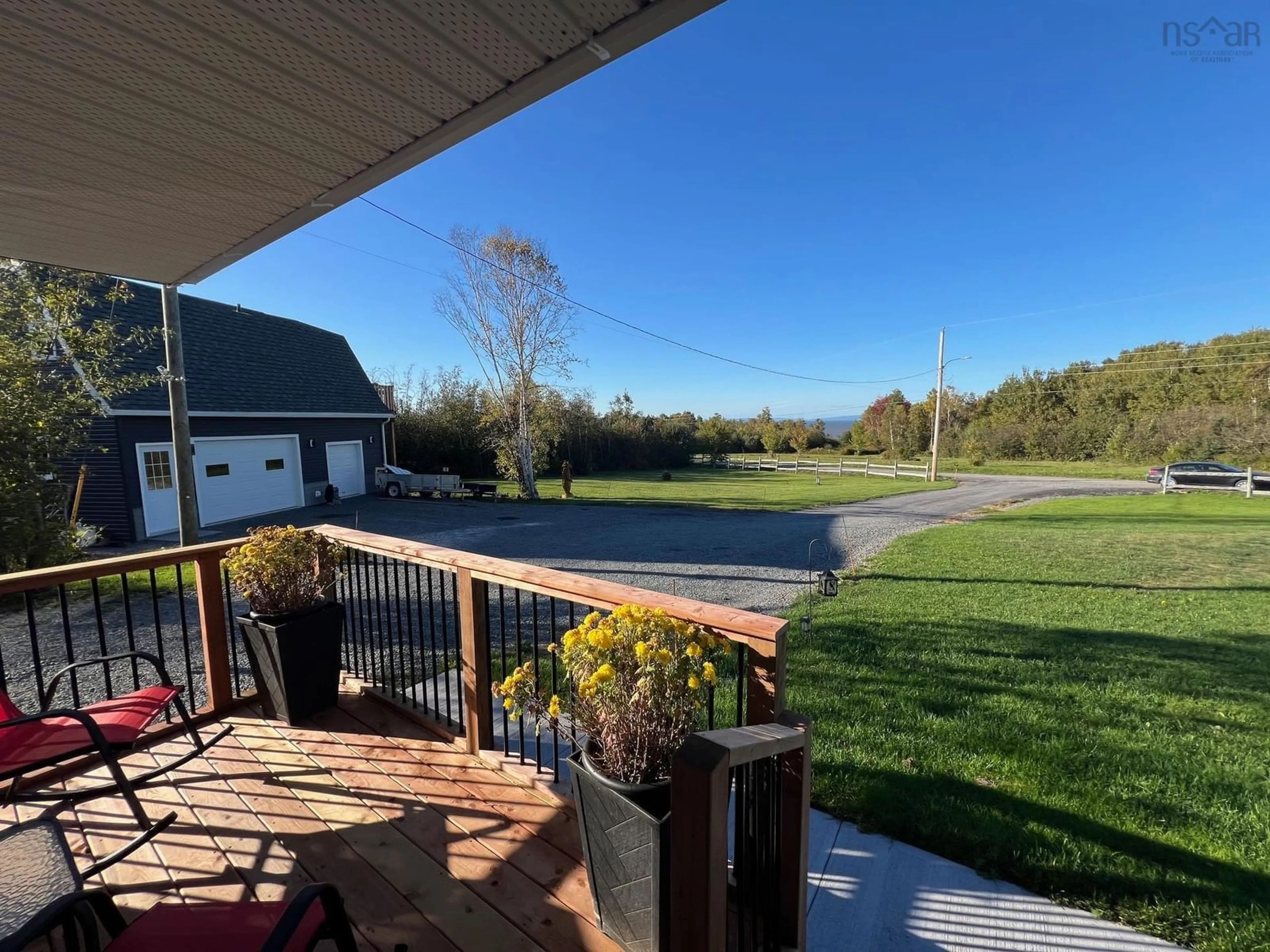 Patio, the fenced backyard for 55 Saubren Lane, Kempt Shore Nova Scotia B0N 2A0