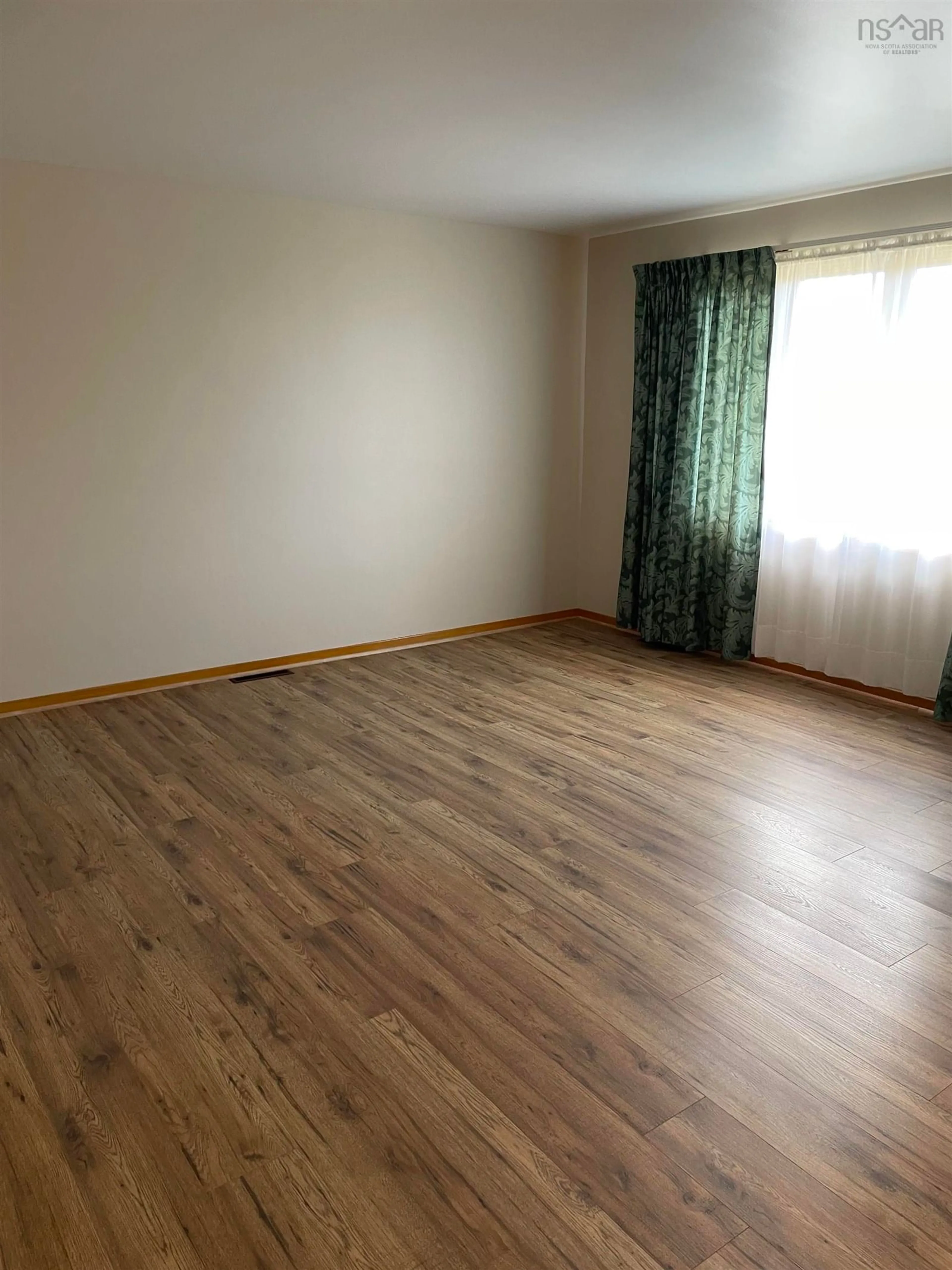 A pic of a room, wood floors for 946 Upper Prince St, Sydney Nova Scotia B1P 5P4