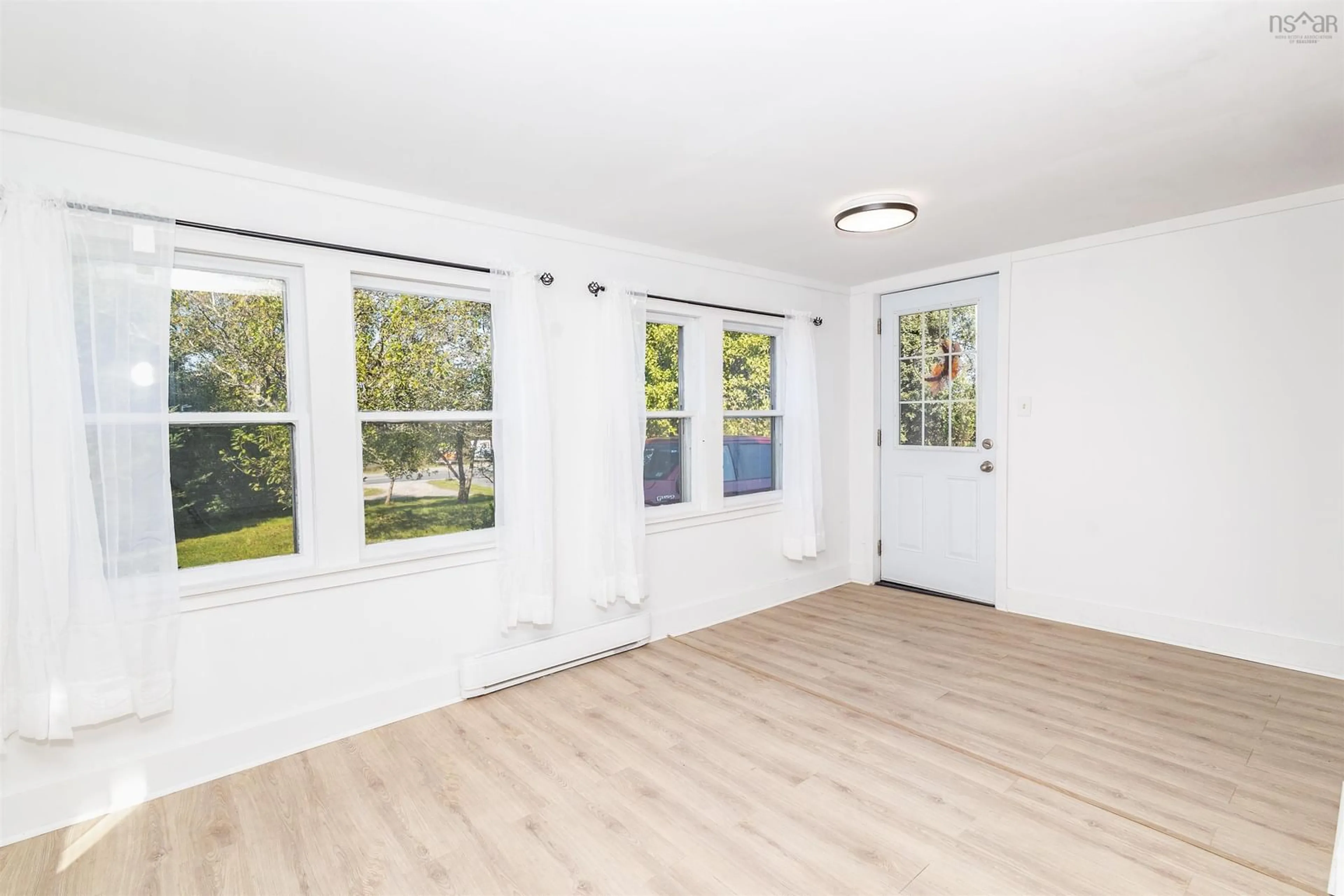 A pic of a room, wood floors for 1441 Kings Rd, Sydney River Nova Scotia B1S 1E4