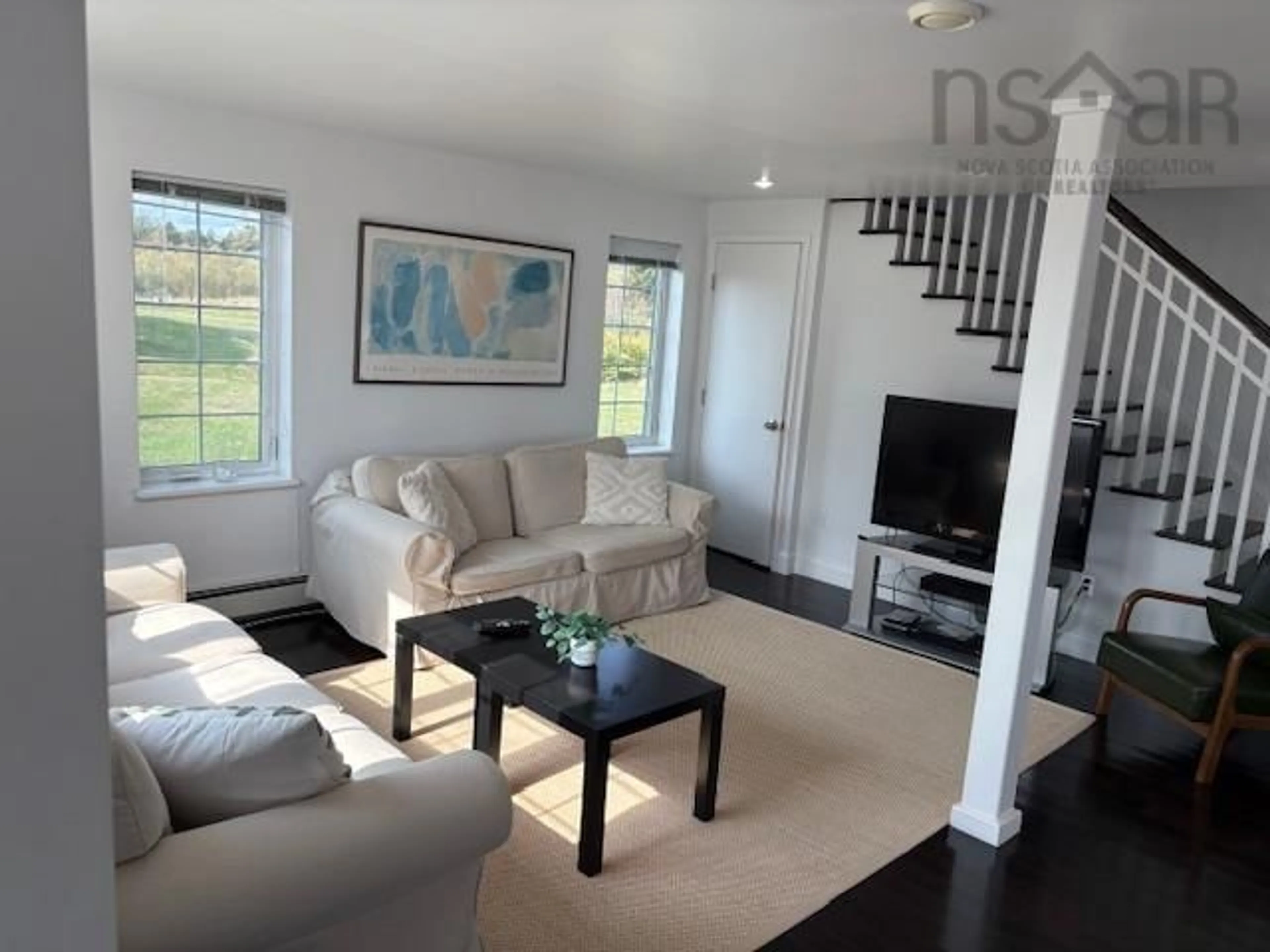 Living room, wood floors for 133 The Point Rd, Blue Rocks Nova Scotia B0J 2C0