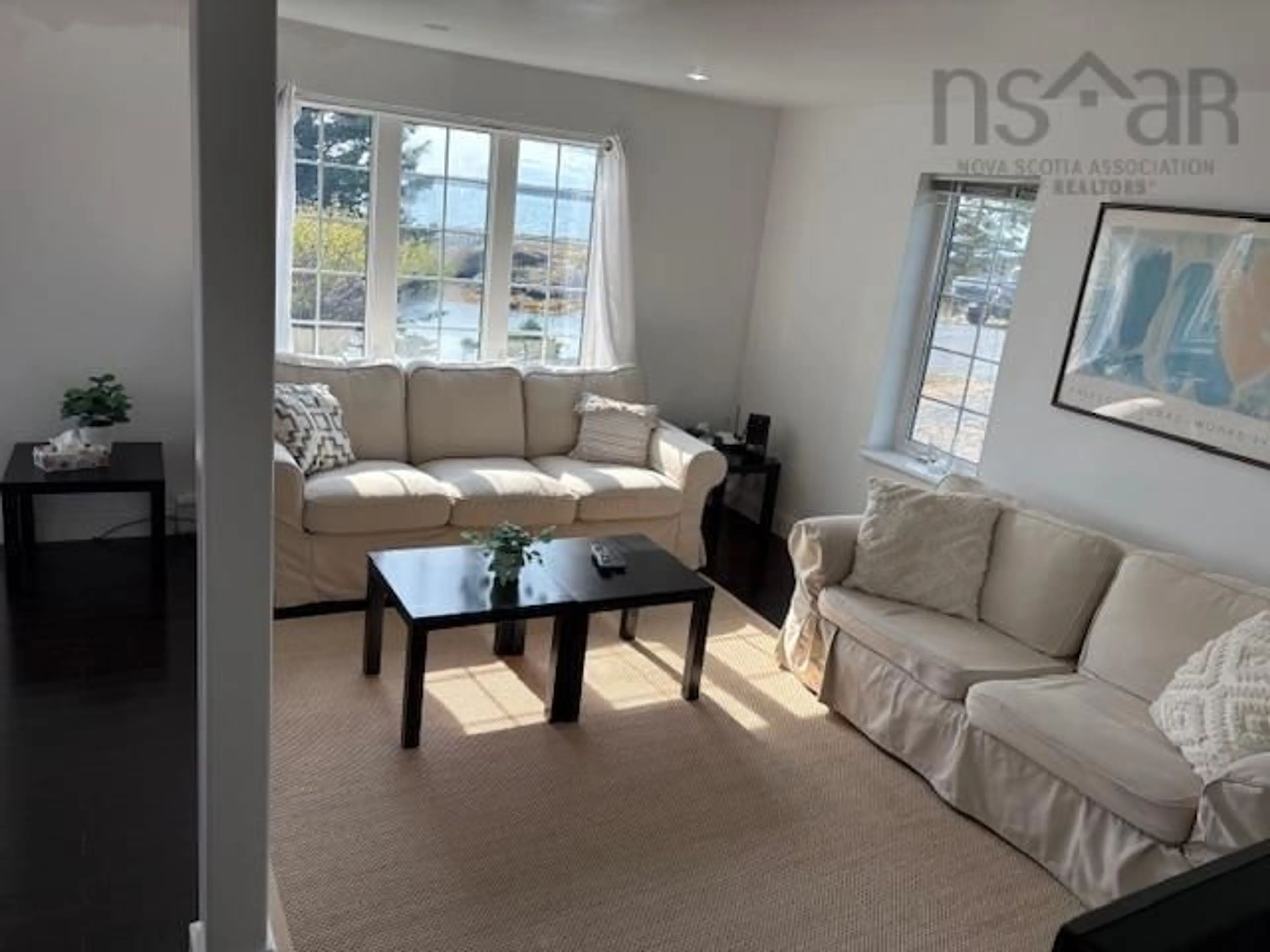 Living room, wood floors for 133 The Point Rd, Blue Rocks Nova Scotia B0J 2C0