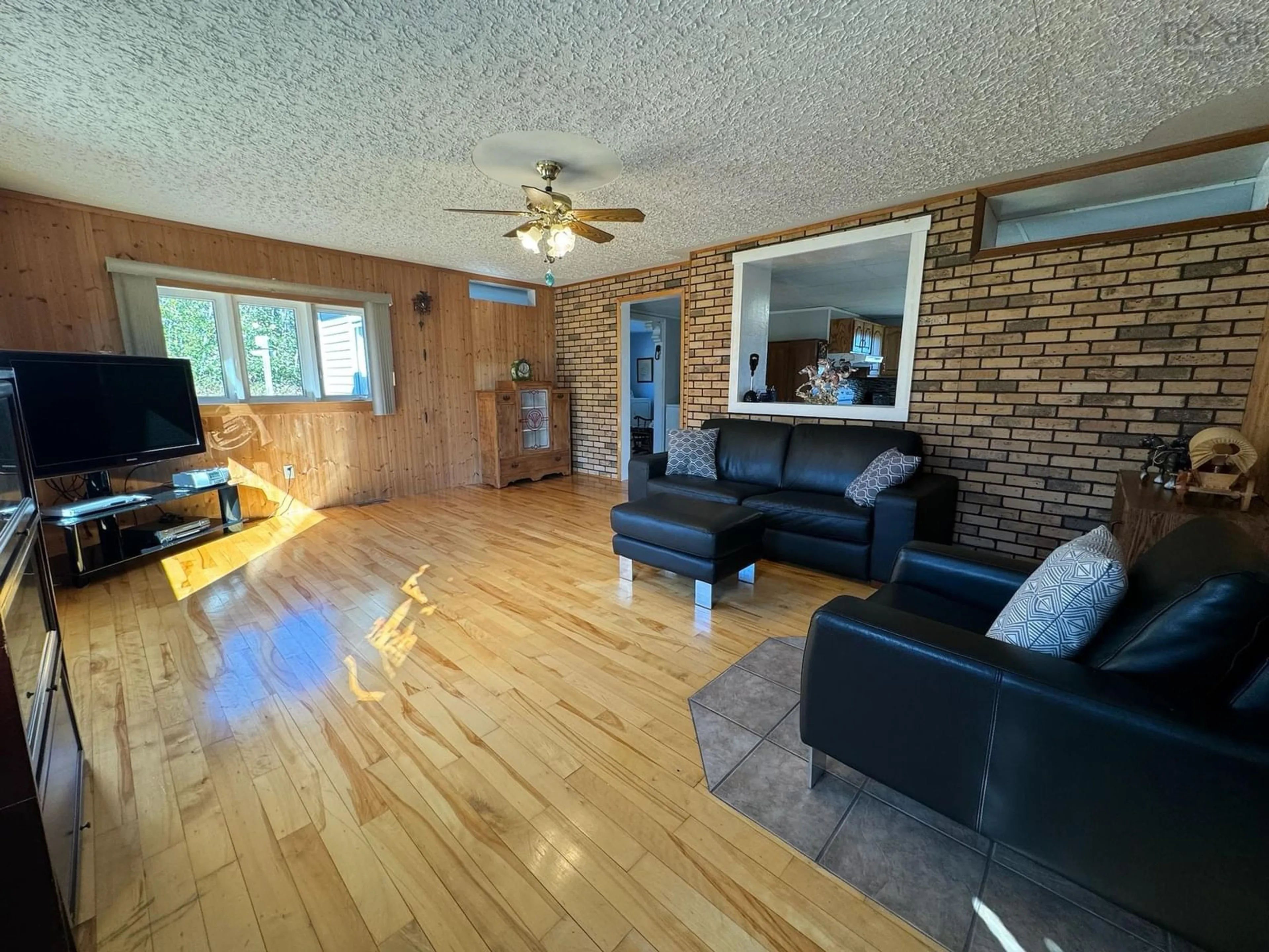 A pic of a room, wood floors for 721 Descousse-Cap La Ronde Rd, Cap La Ronde Nova Scotia B0E 1K0