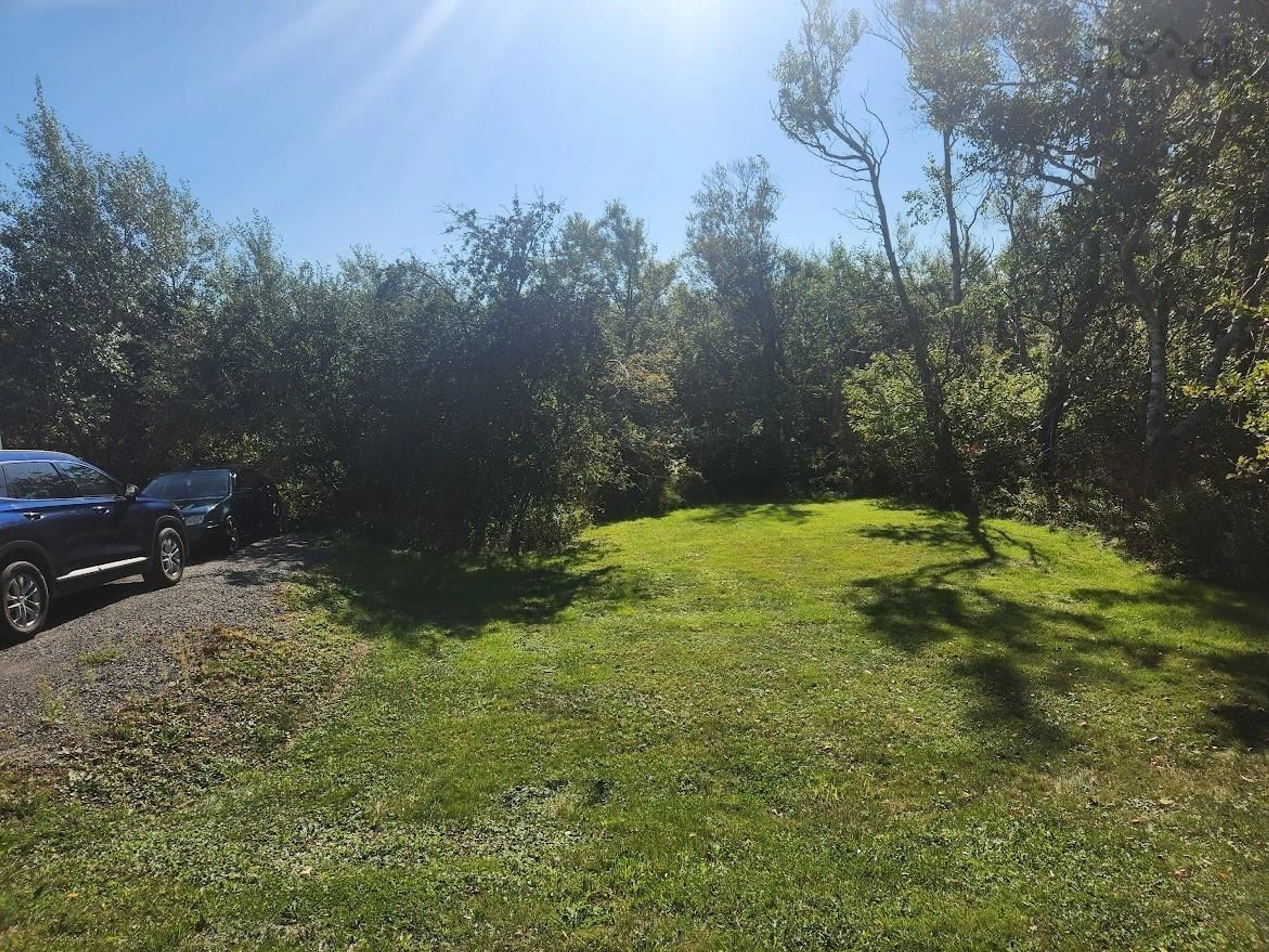 A pic from outside/outdoor area/front of a property/back of a property/a pic from drone, forest/trees view for 79 Highland St, Glace Bay Nova Scotia B1A 2T7