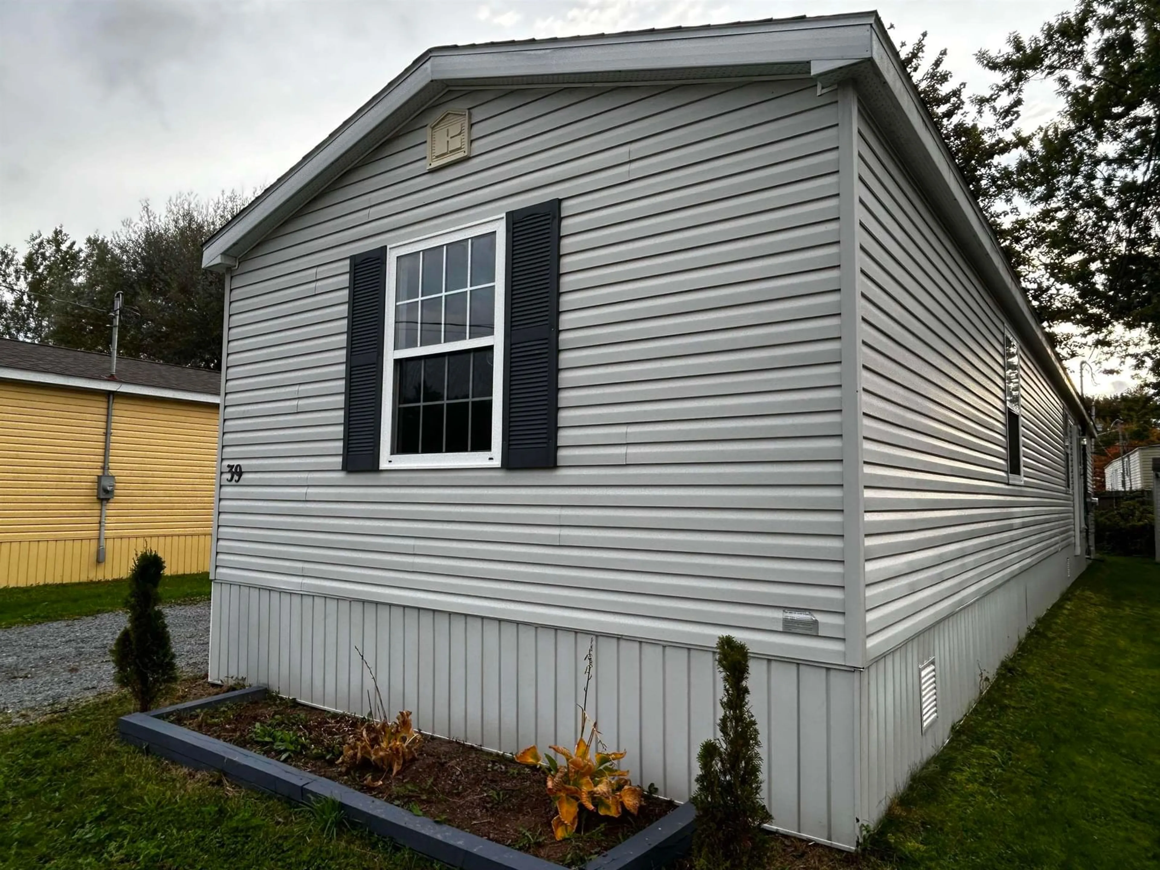 Home with vinyl exterior material for 39 Brook Cres, Middle Sackville Nova Scotia B4E 1C3