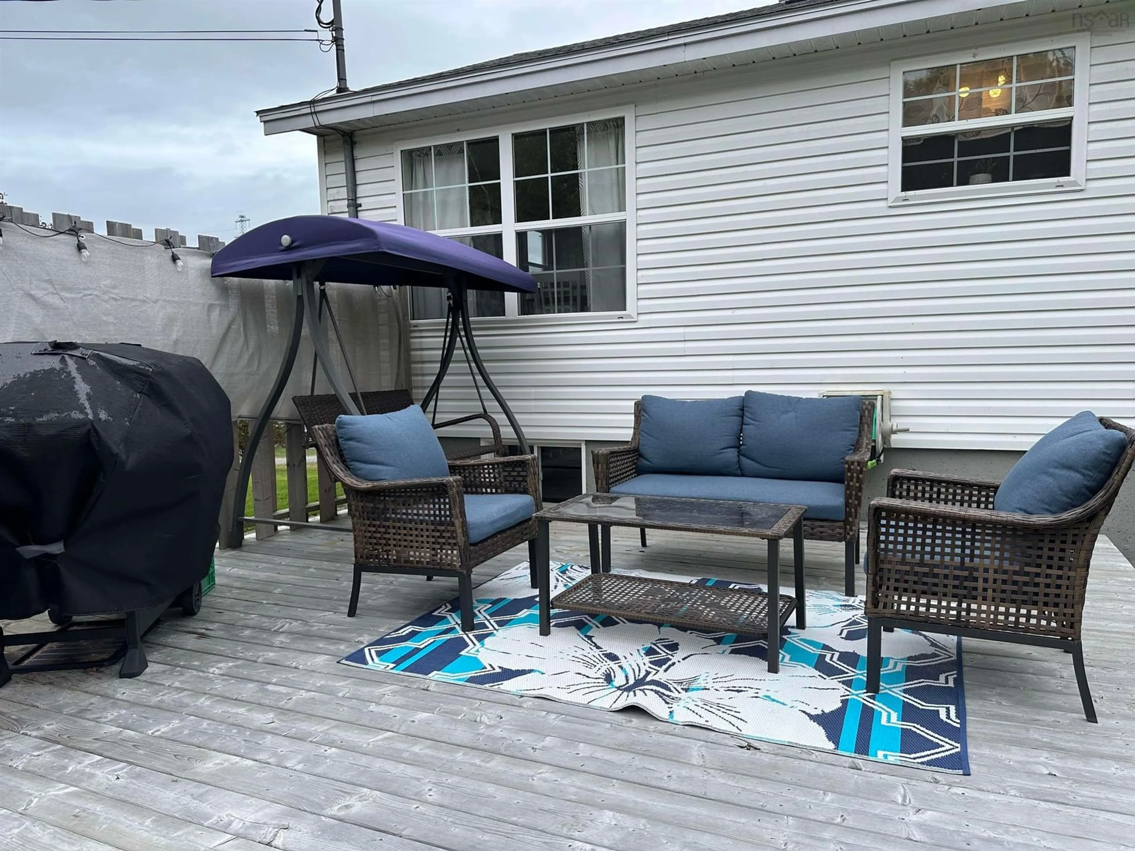 Patio, the fenced backyard for 19 Obrien Rd, Aulds Cove Nova Scotia B0H 1P0