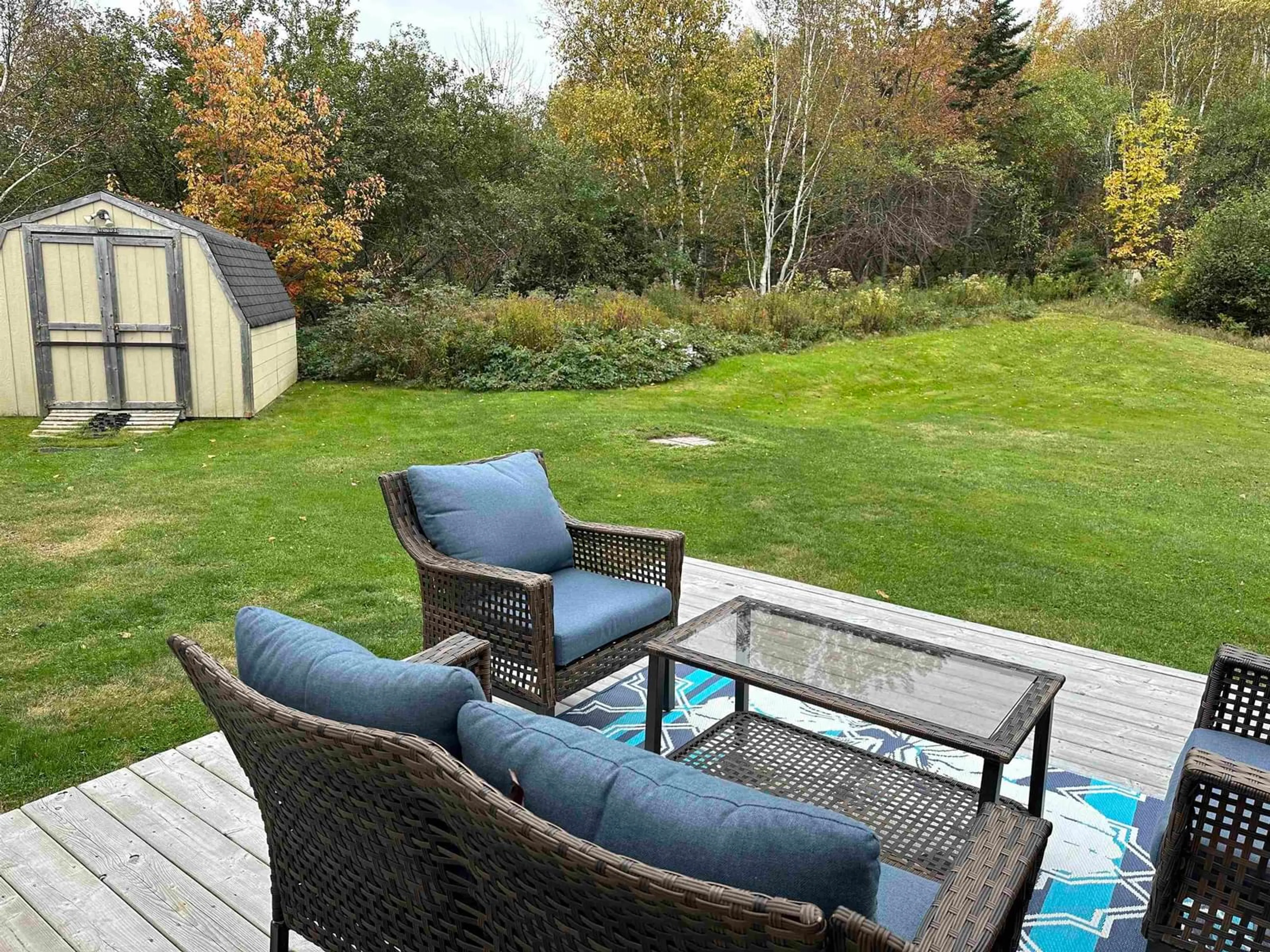 Patio, the fenced backyard for 19 Obrien Rd, Aulds Cove Nova Scotia B0H 1P0