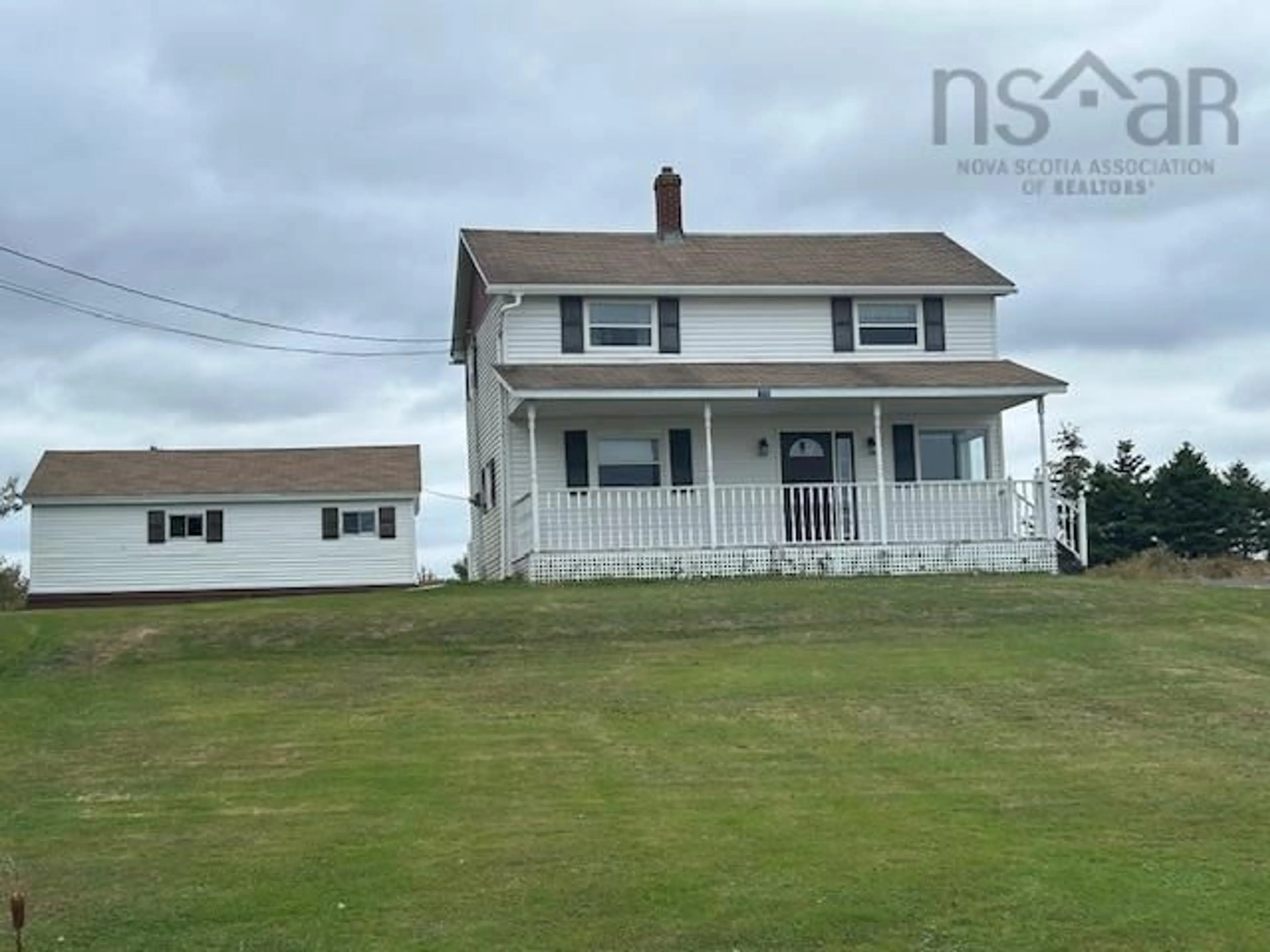 Frontside or backside of a home, cottage for 98 Cove Rd, West Arichat Nova Scotia B0E 3J0