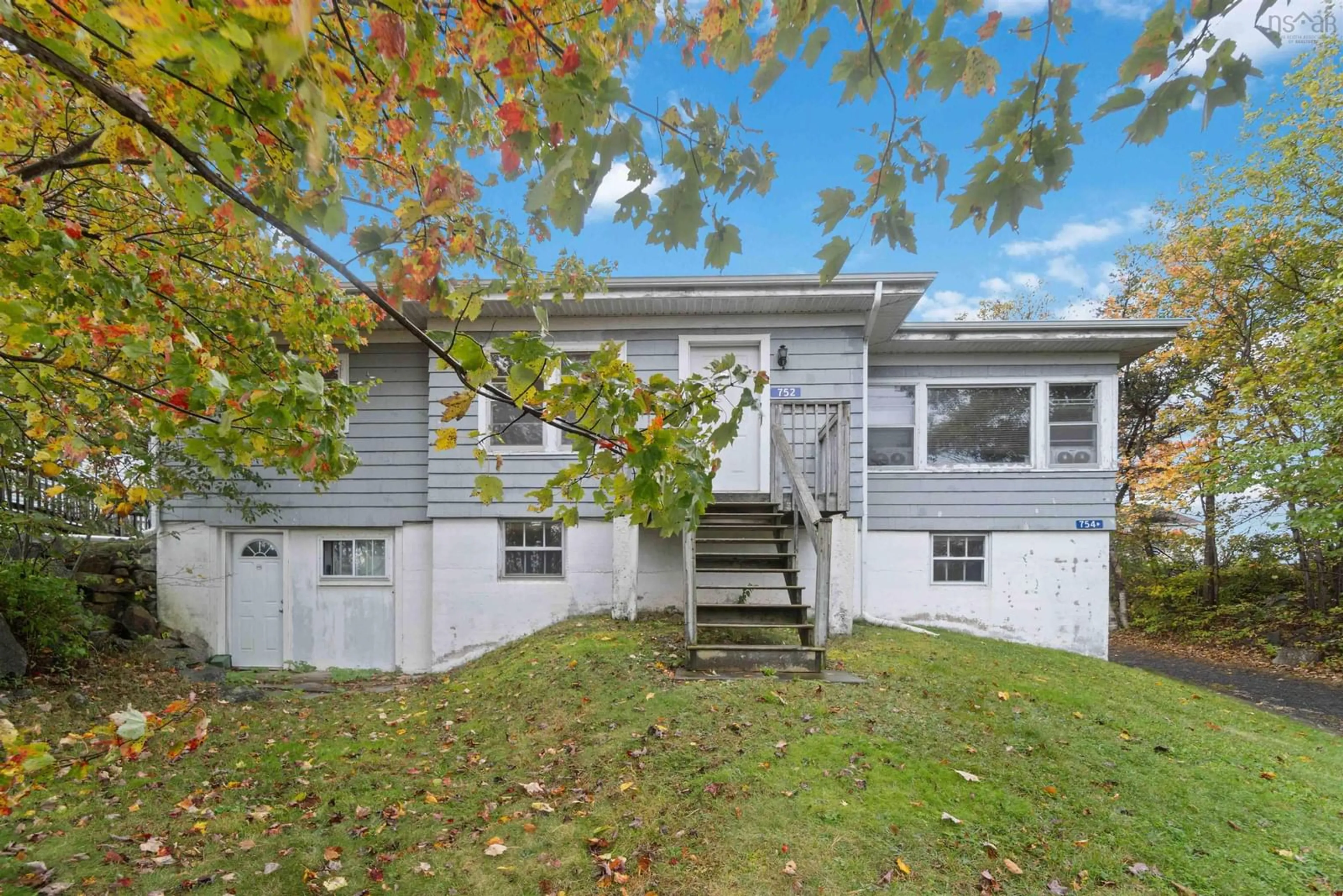 A pic from exterior of the house or condo, the fenced backyard for 752/754 St Margarets Bay Rd, Armdale Nova Scotia B3N 1K7