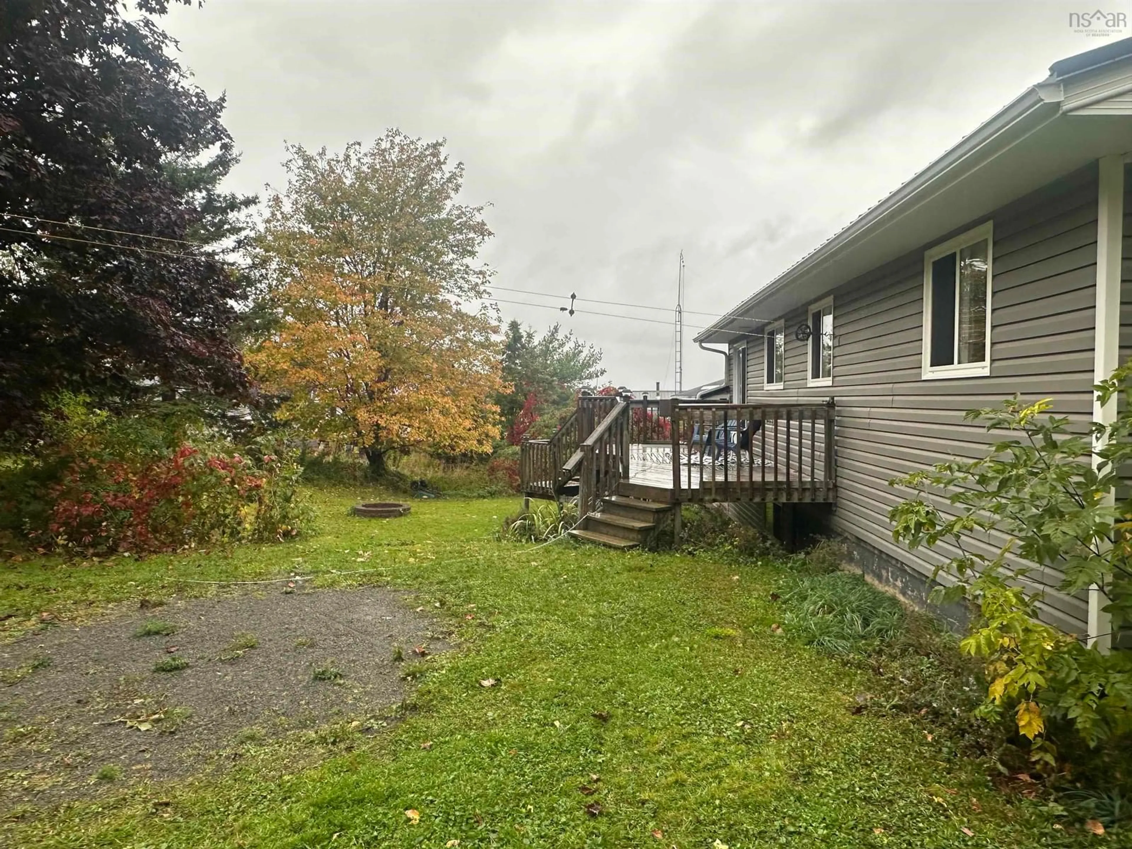 Frontside or backside of a home, the fenced backyard for 50 Princess Ave, Trenton Nova Scotia B0K 1X0