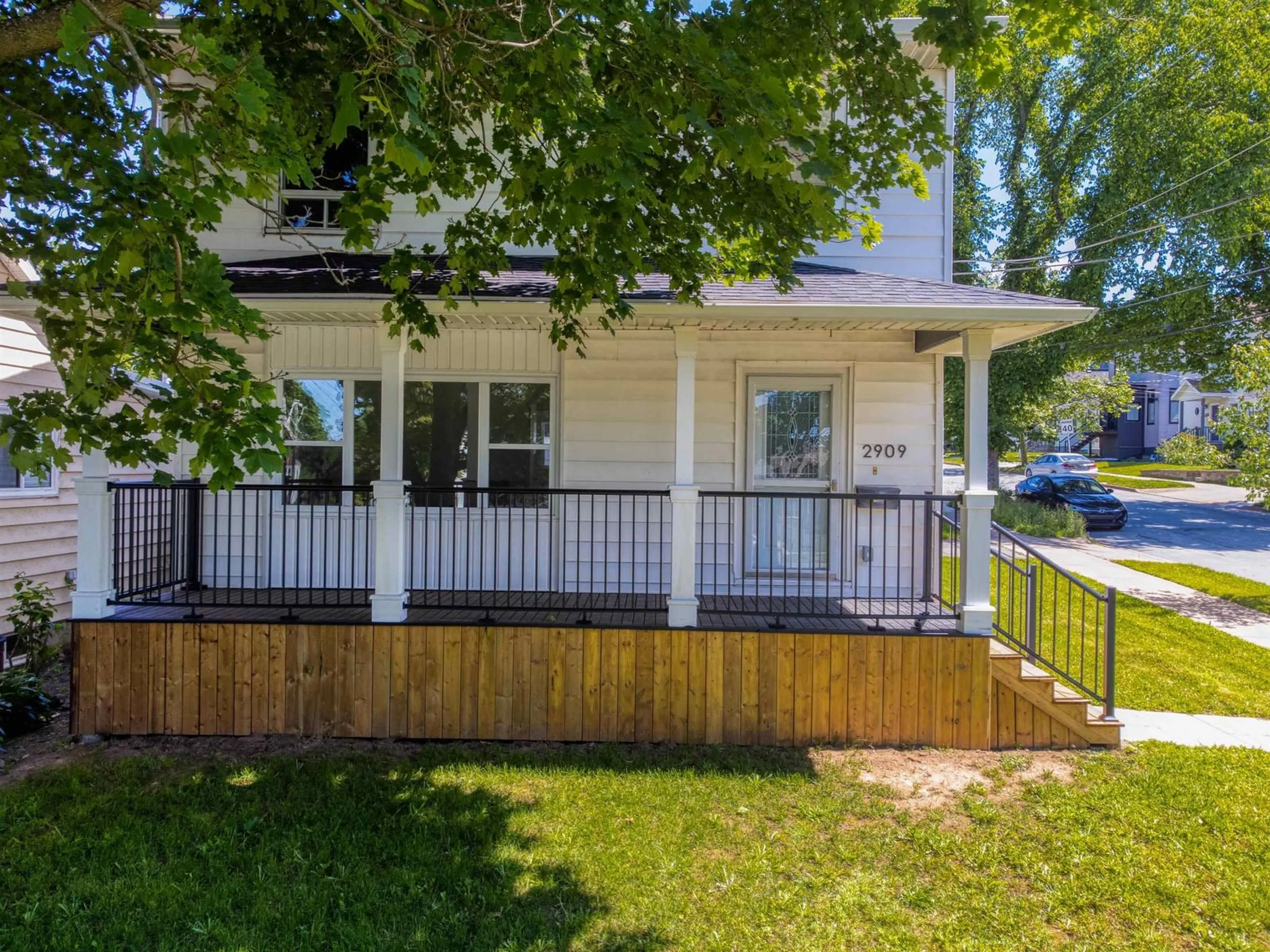 Frontside or backside of a home, the fenced backyard for 2909 Connaught Avenue, Halifax Nova Scotia B3L 3A3