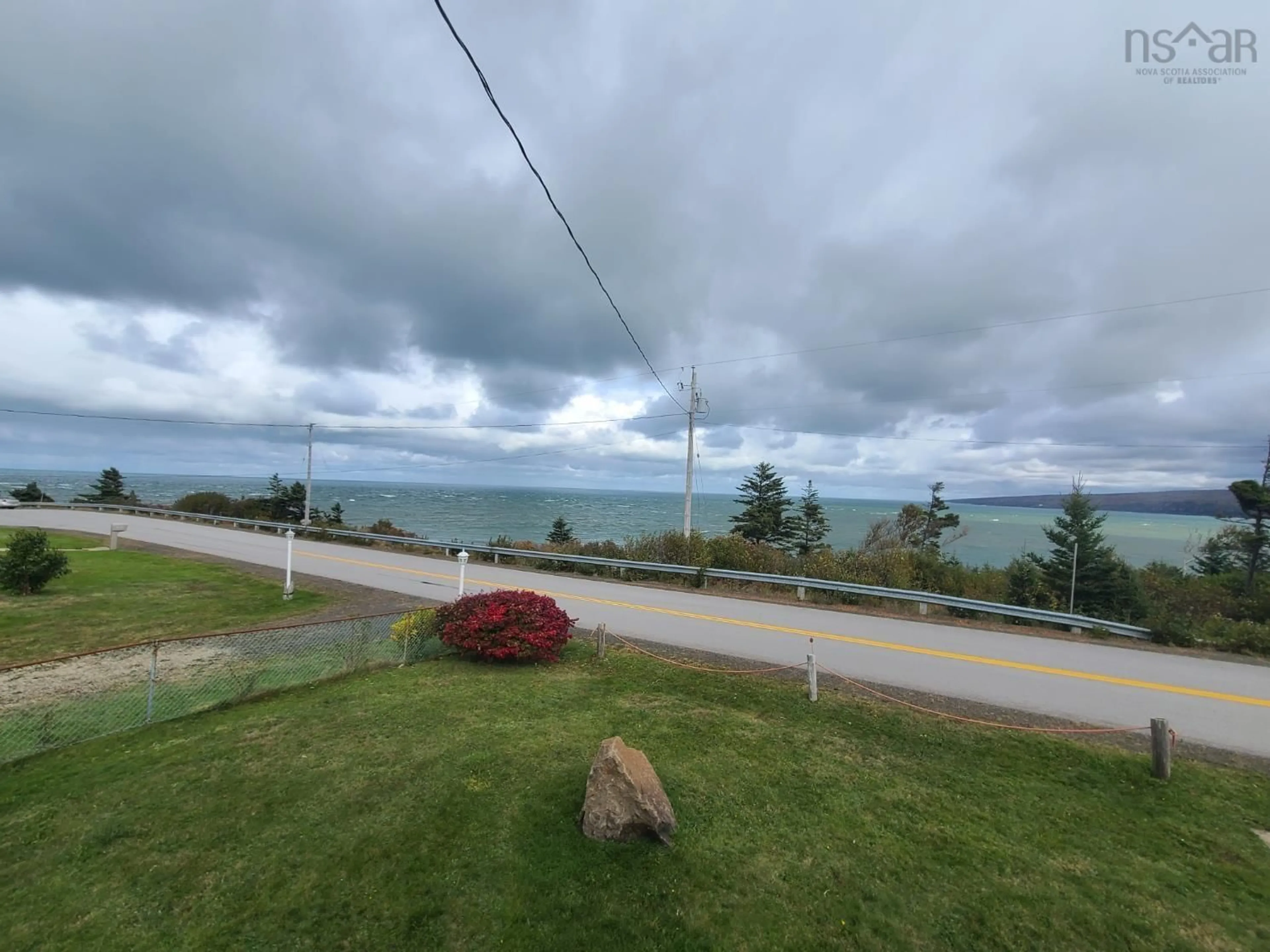 A pic from exterior of the house or condo, the street view for 1407 Lighthouse Road, Bay View Nova Scotia B0V 1A0