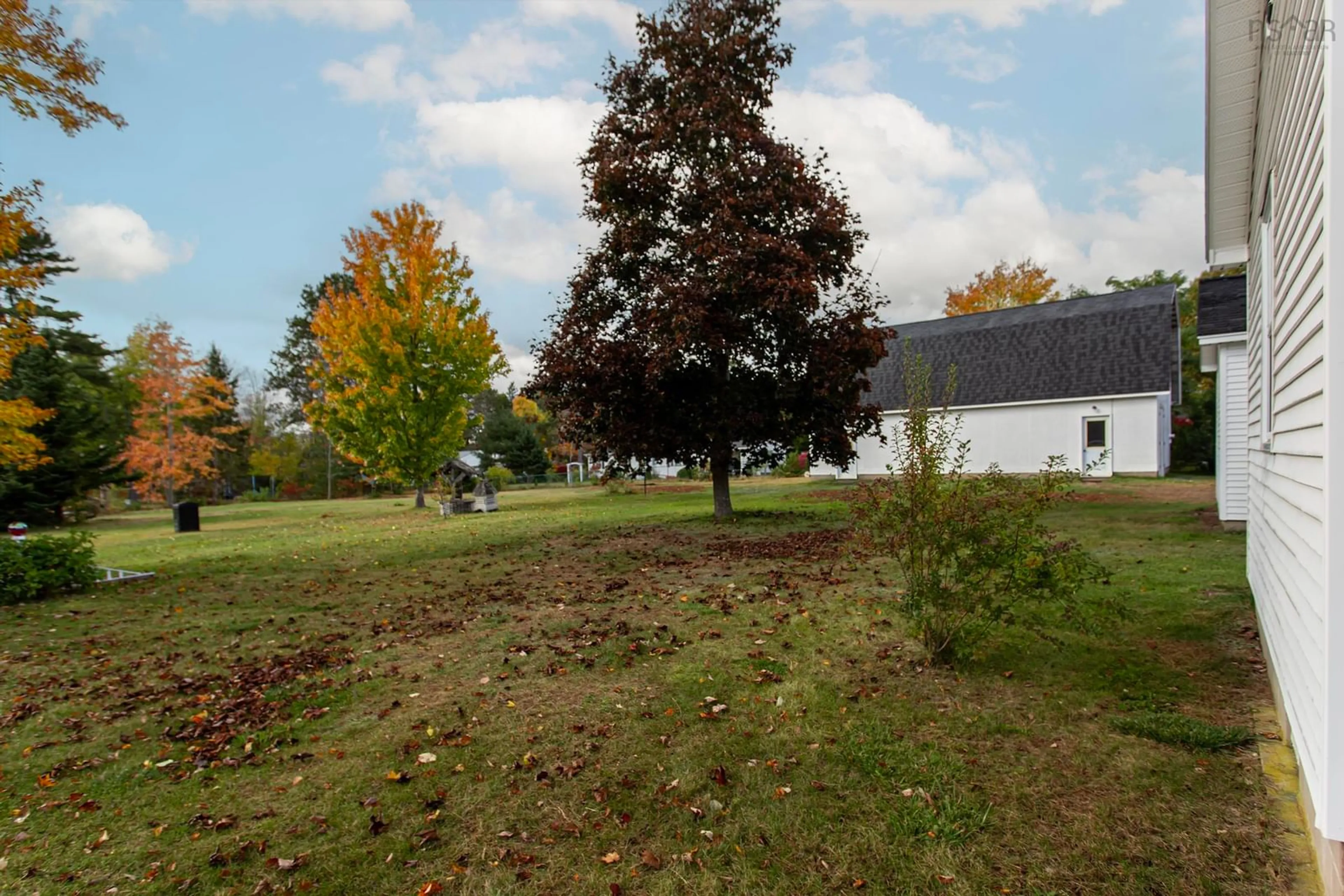 Frontside or backside of a home, the fenced backyard for 1105-1107 Neily Cres, Greenwood Nova Scotia B0P 1R0