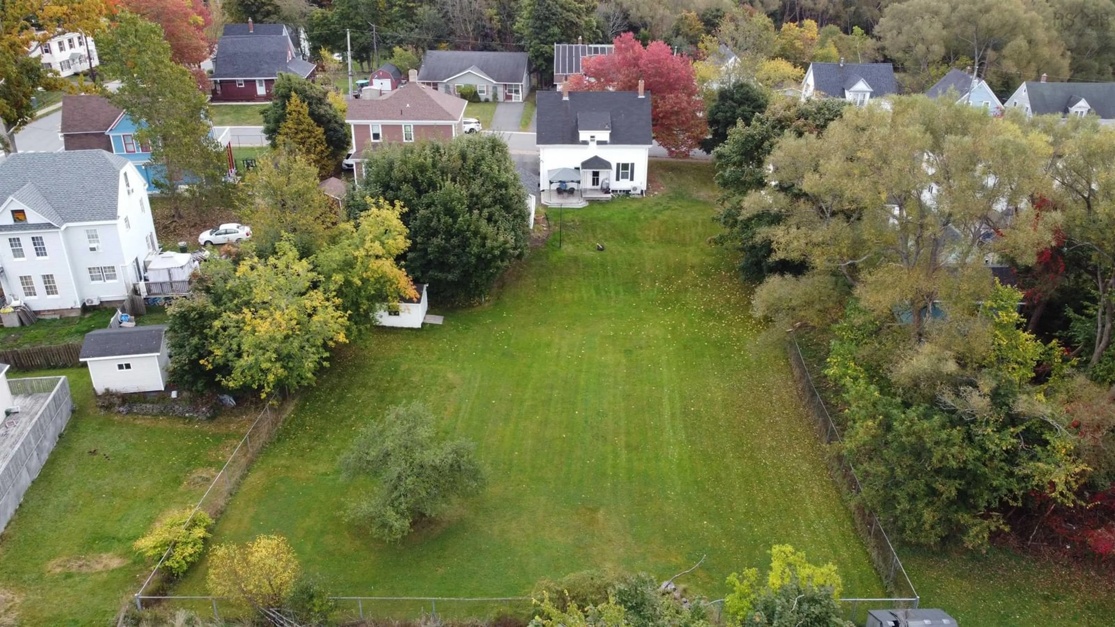 Frontside or backside of a home, the fenced backyard for 307 Albert St, New Glasgow Nova Scotia B2H 3V7