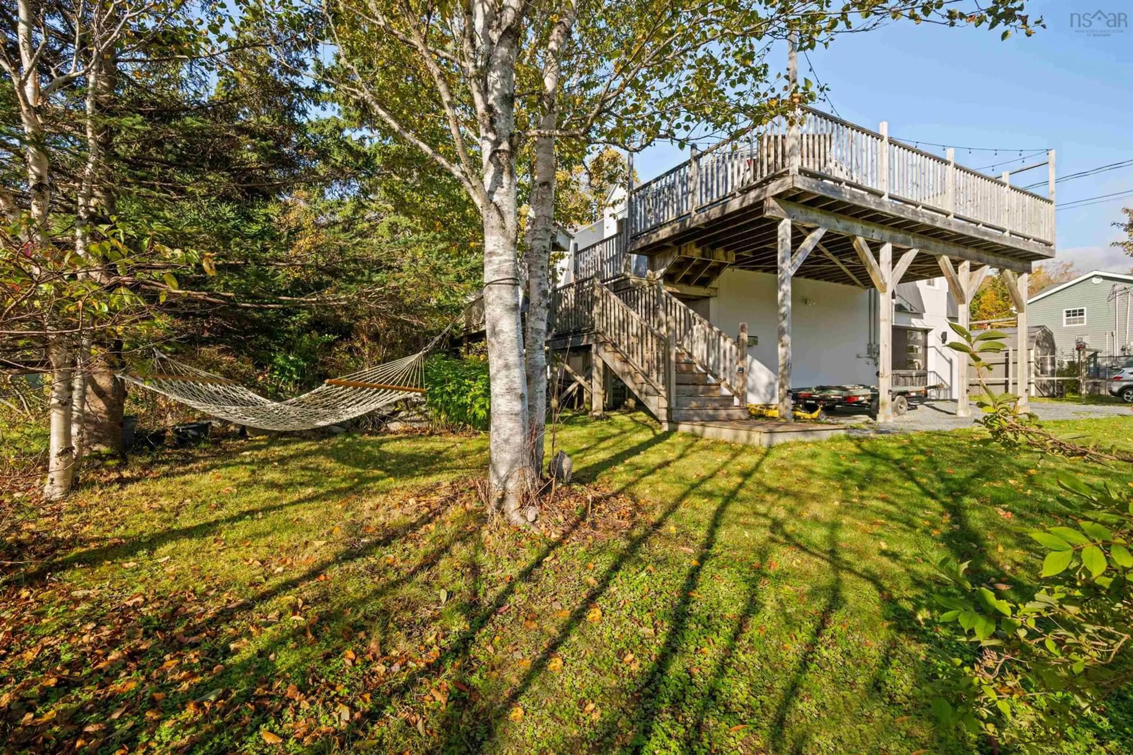A pic from exterior of the house or condo, the fenced backyard for 735 Terence Bay Rd, Terence Bay Nova Scotia B3T 1X2