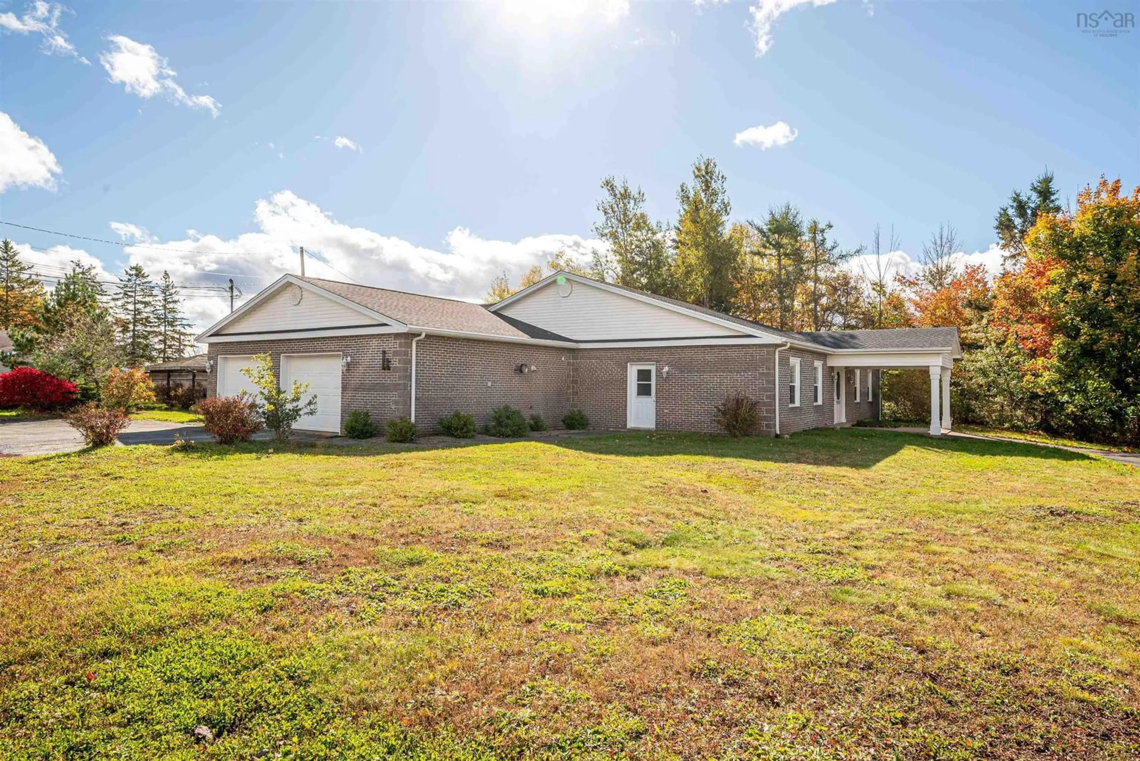 Frontside or backside of a home, the fenced backyard for 73 Grove Ave, Beaver Bank Nova Scotia B4G 1B7