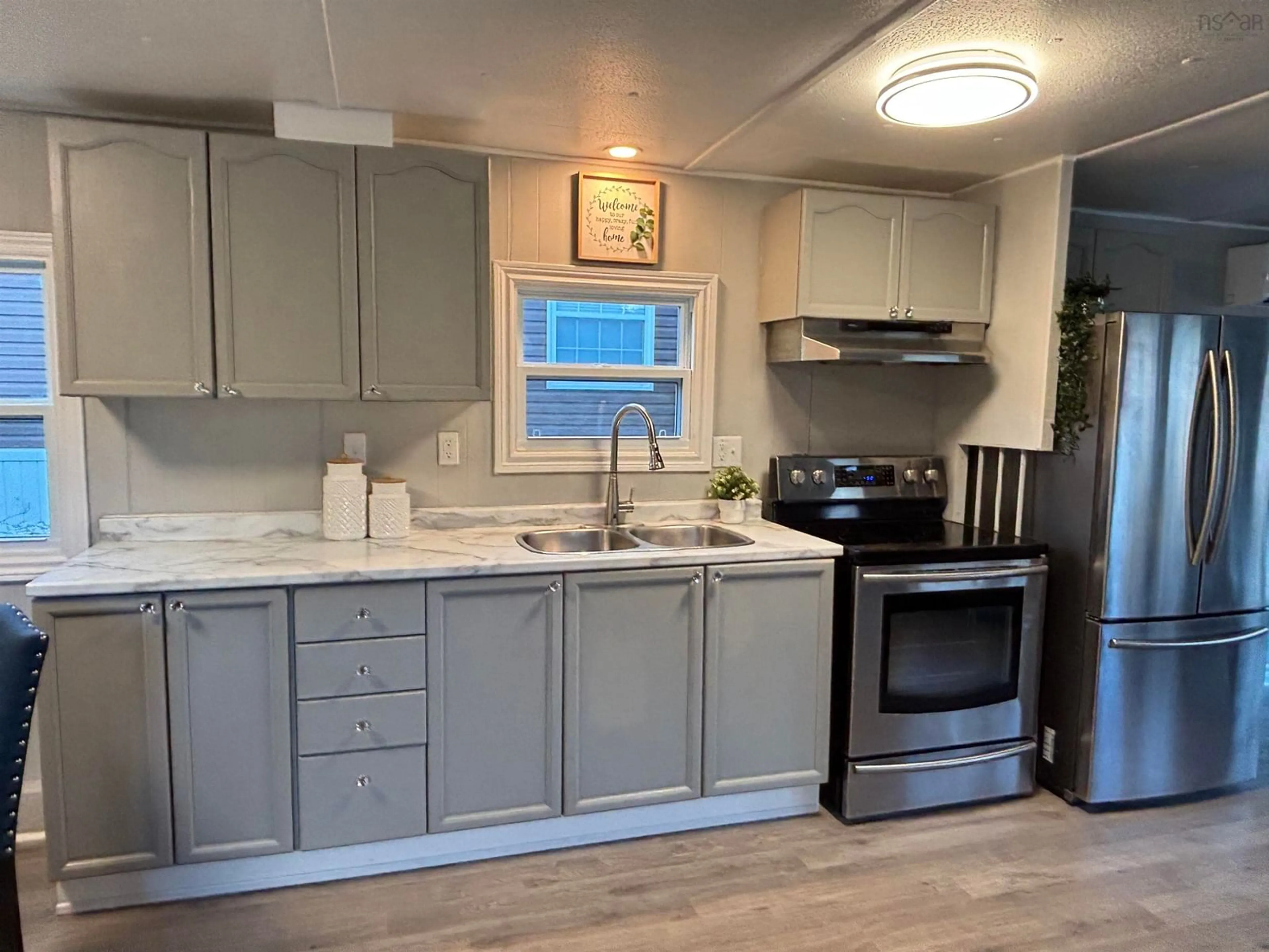 Open concept kitchen for 2 Bashful Ave, Lake Echo Nova Scotia B3E 1B9