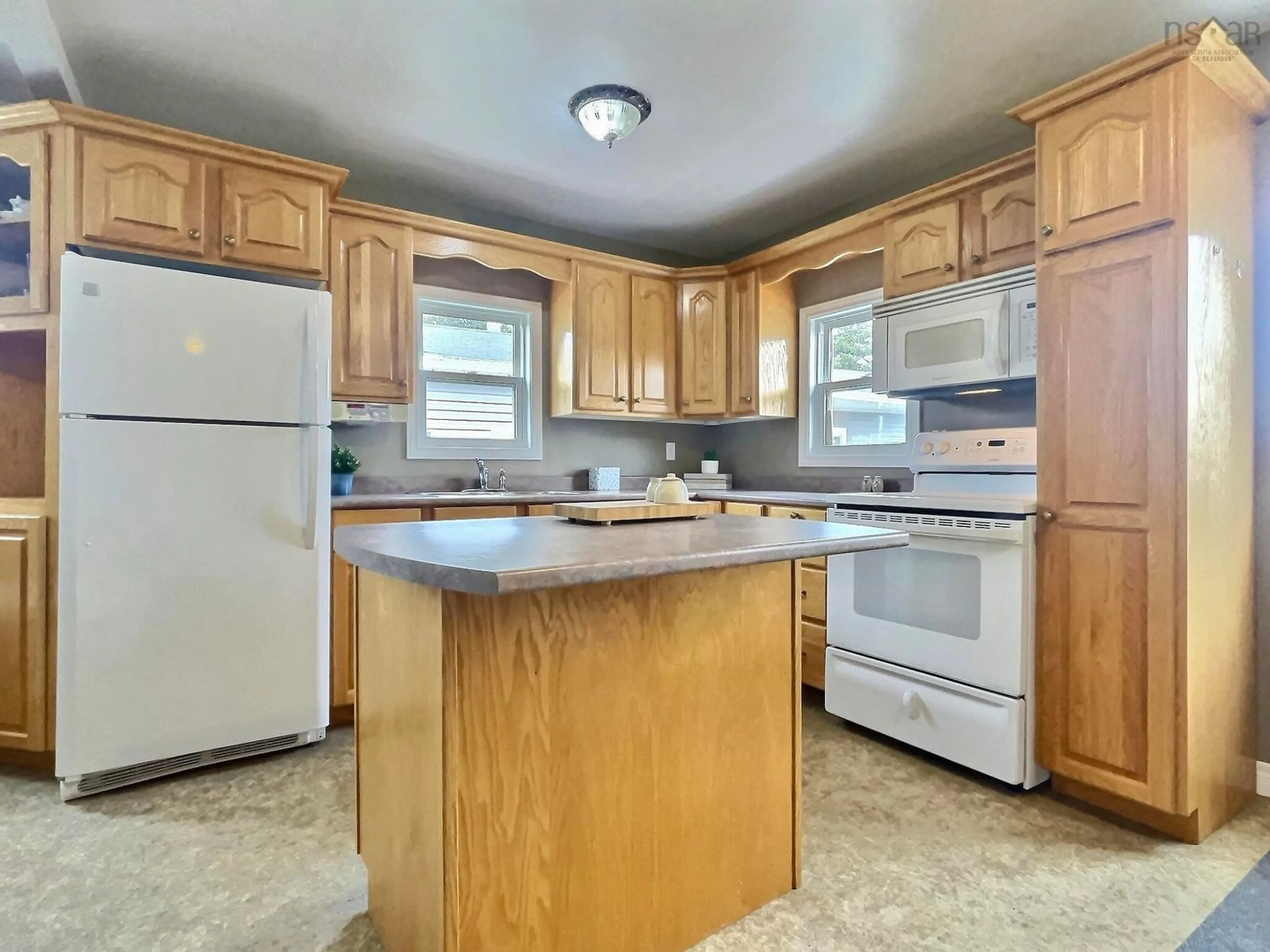 Standard kitchen, wood floors, cottage for 96 & 98 Chemin Hache, Point Cross Nova Scotia B0E 1H0