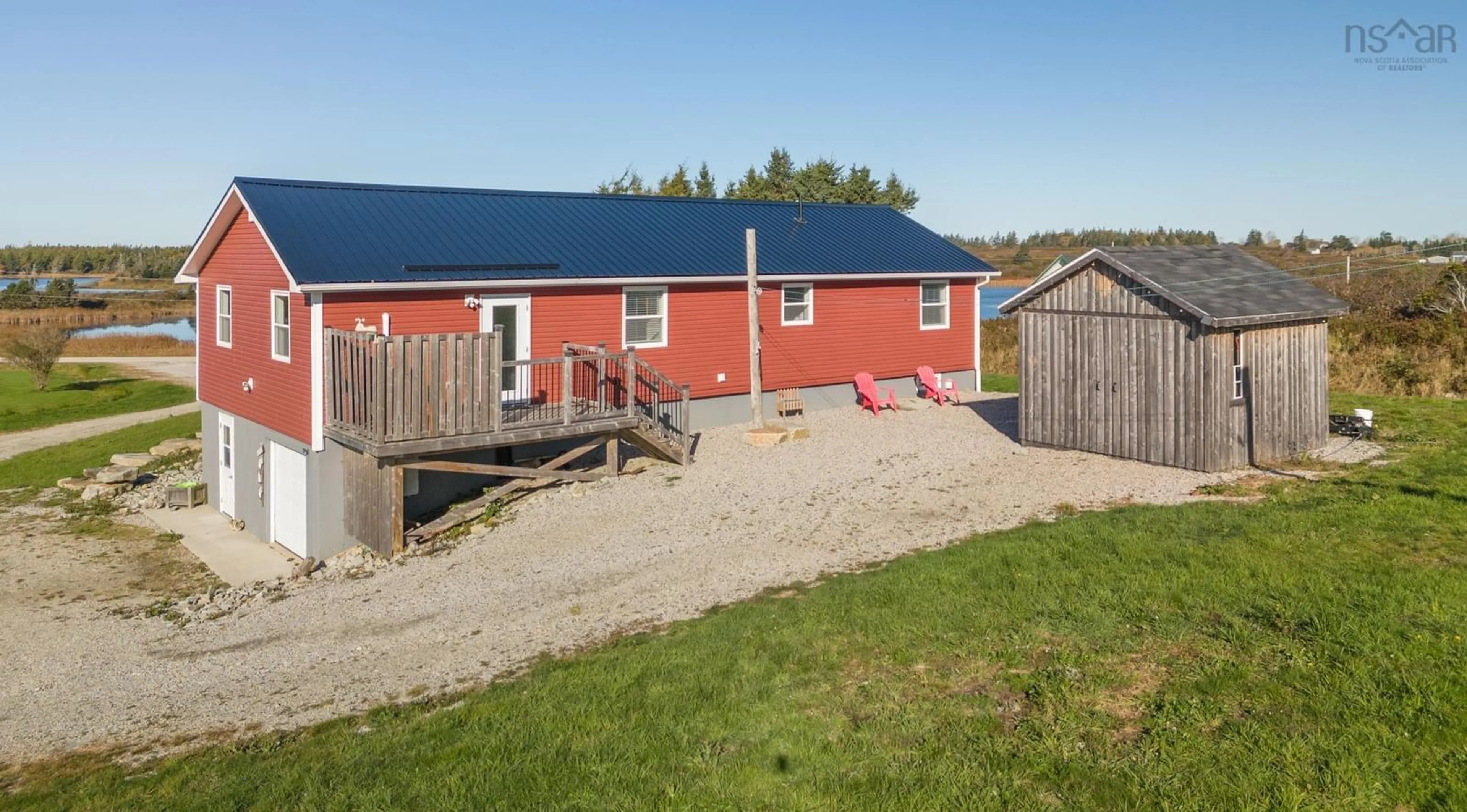 A pic from exterior of the house or condo, the fenced backyard for 4256 Highway 1, Beaver River Nova Scotia B5A 5B1