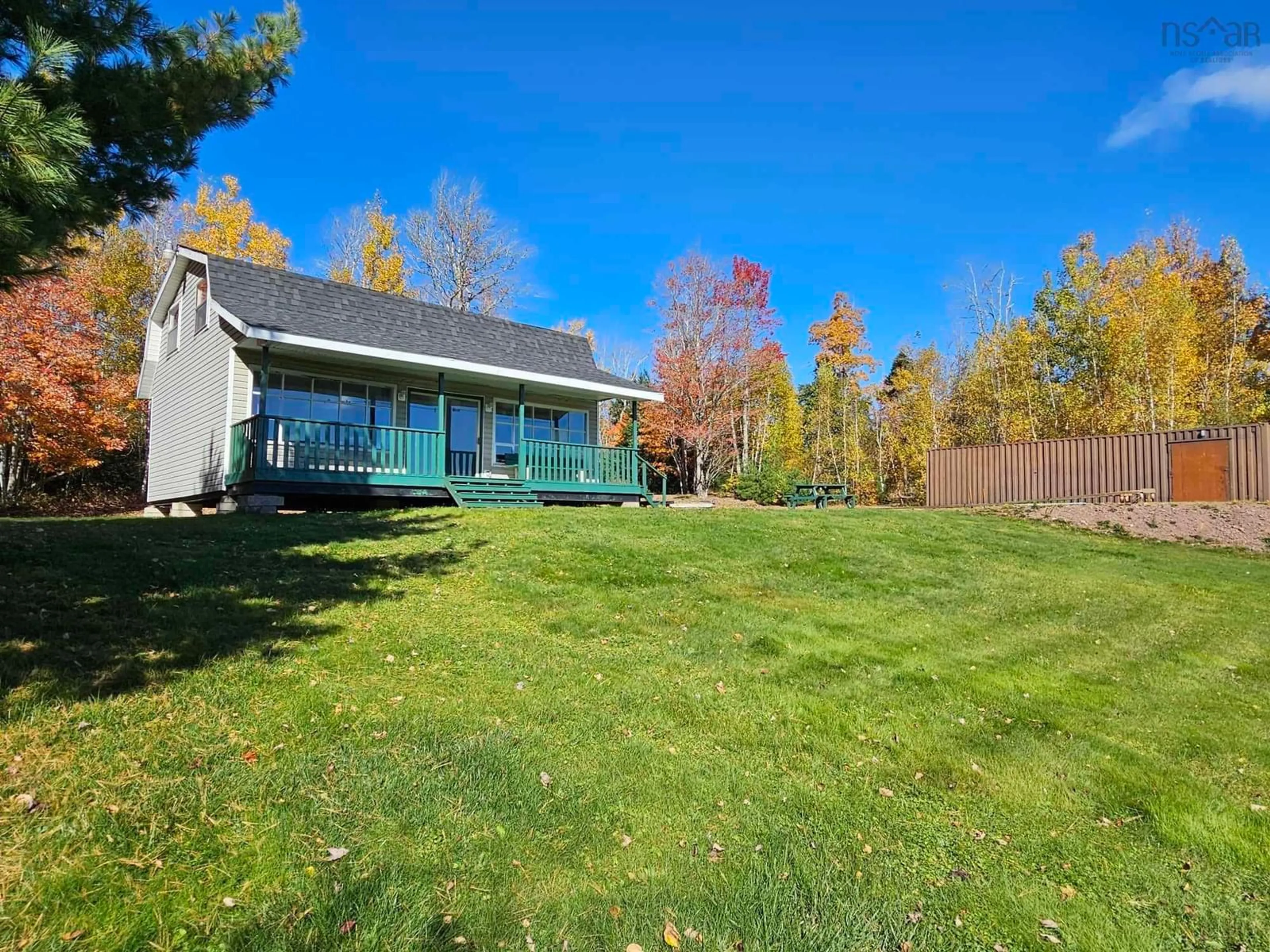 Frontside or backside of a home, the fenced backyard for 31 Bass Cove Rd, Wentworth Nova Scotia B0M 1Z0