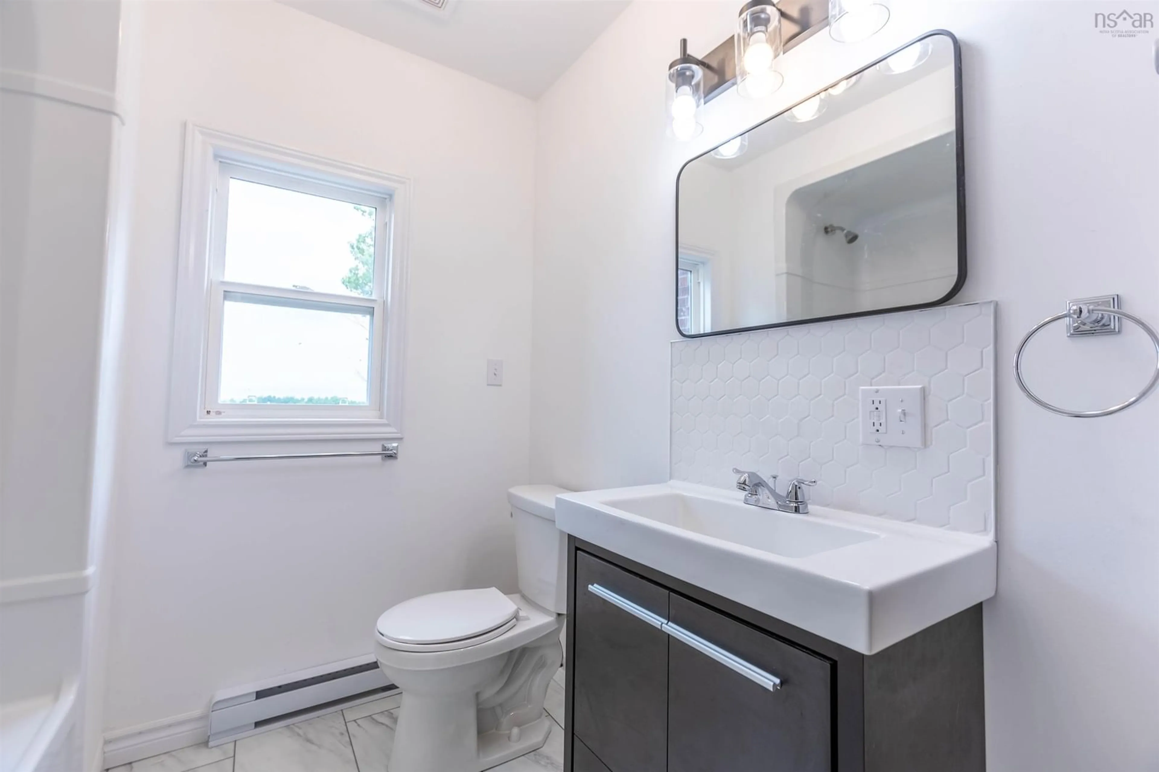 Standard bathroom, wood floors for 425 Tyndal Rd, Amherst Nova Scotia B4H 3X9