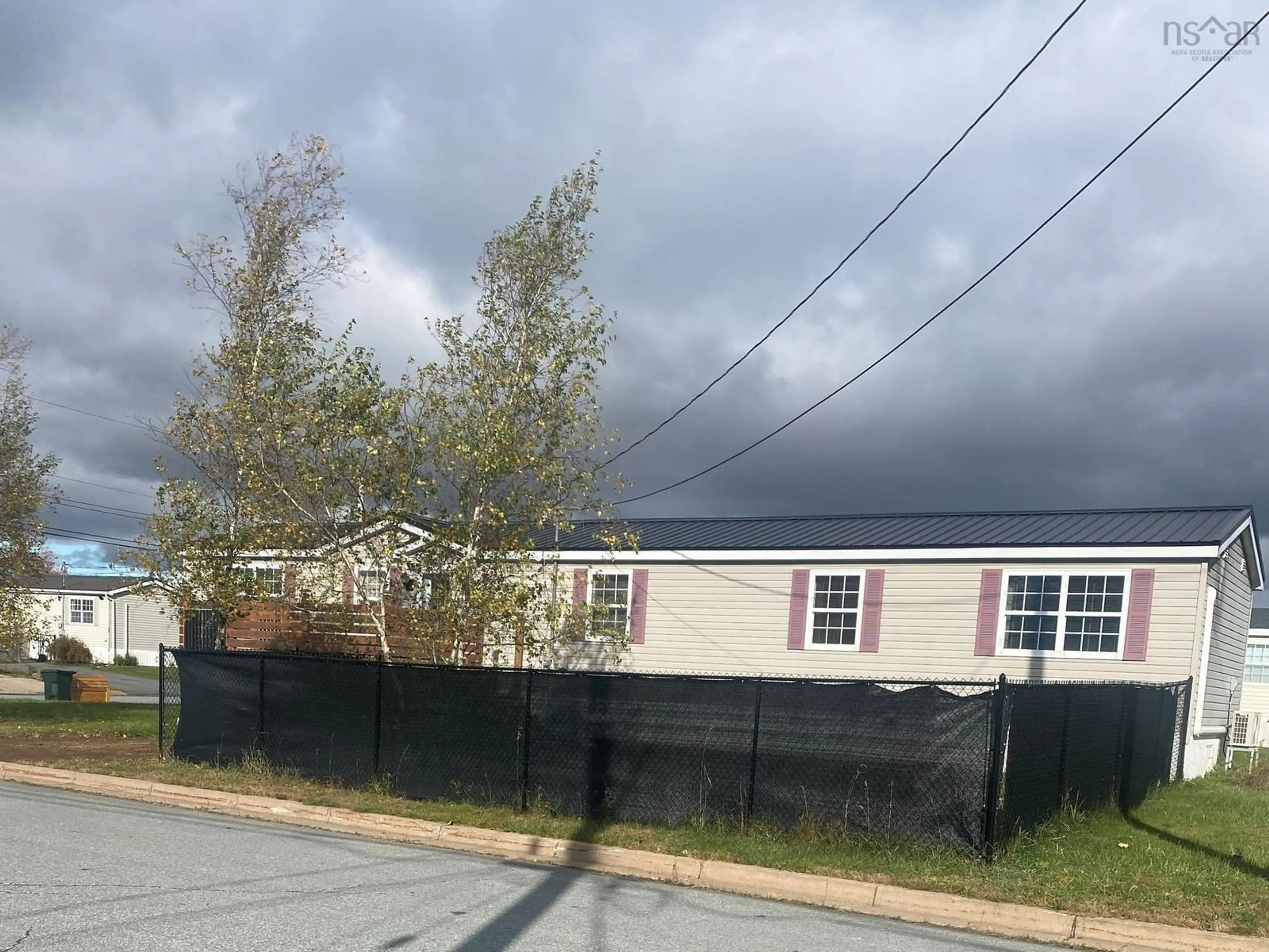 Frontside or backside of a home, the fenced backyard for 63 Empire Loop, Truro Nova Scotia B2N 7B5