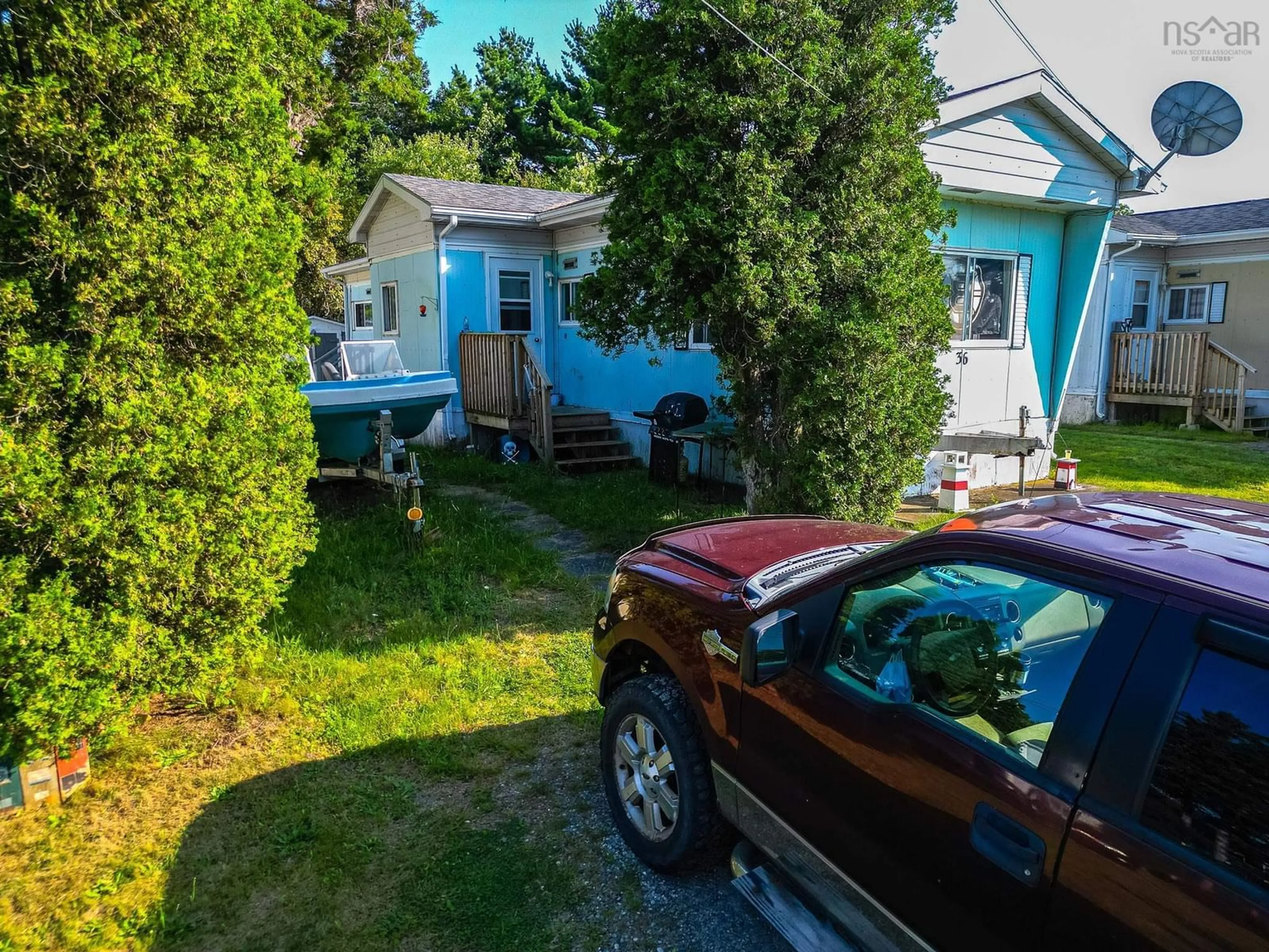 Frontside or backside of a home, the street view for 36 Commission St, Shelburne Nova Scotia B0T 1W0