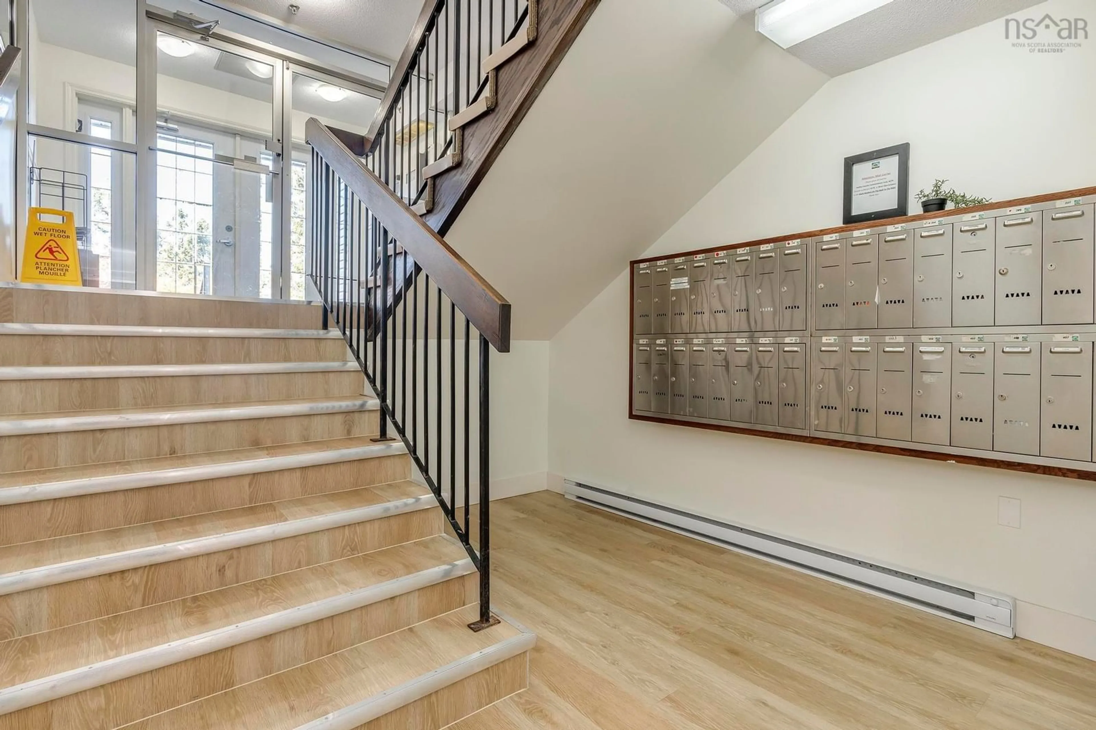 Indoor foyer, wood floors for 51 River Lane #105, Bedford Nova Scotia B4A 3Y8