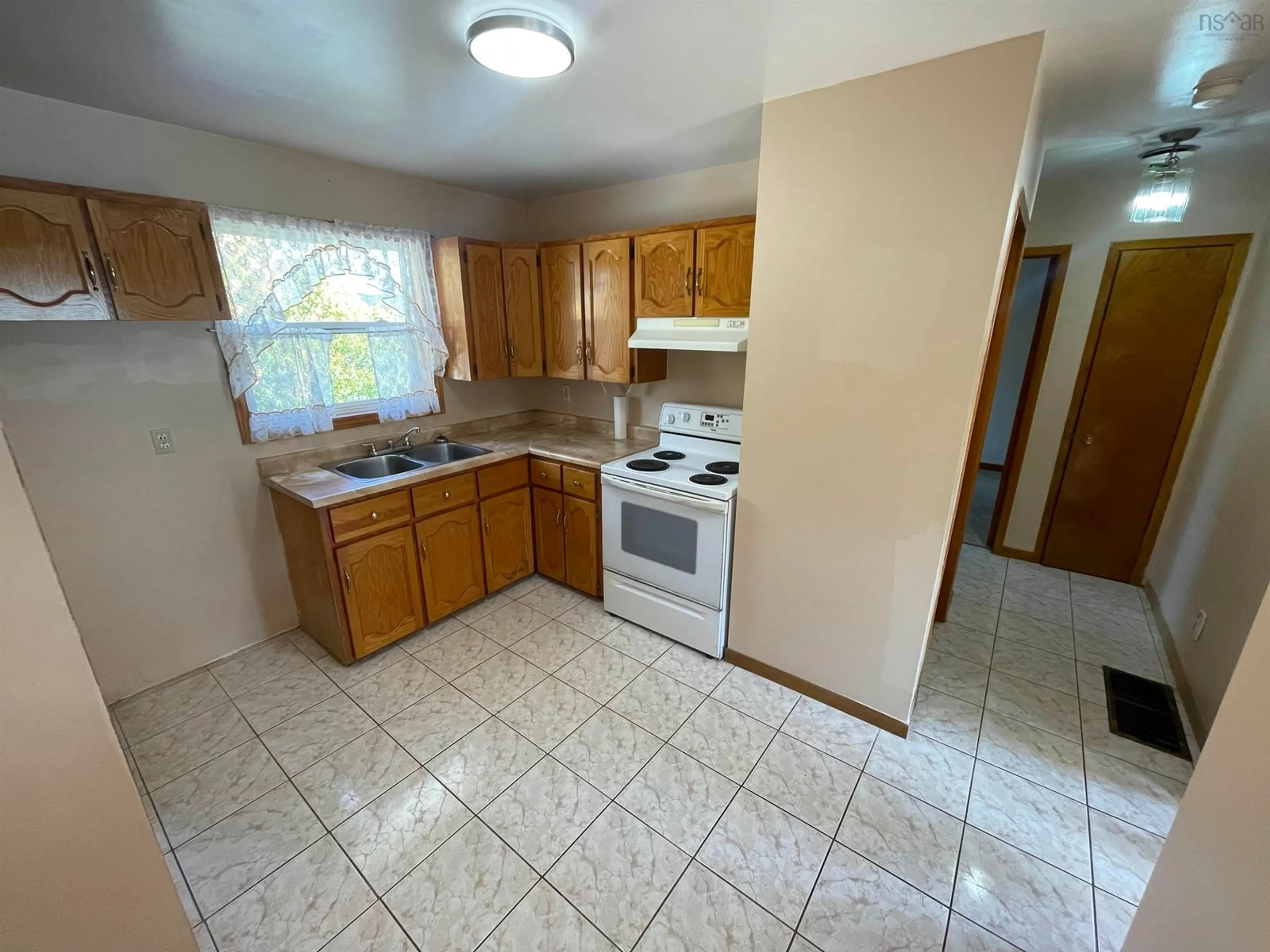 Standard kitchen, unknown floor, cottage for 83 Christopher Cres, Sydney Nova Scotia B1P 6T1