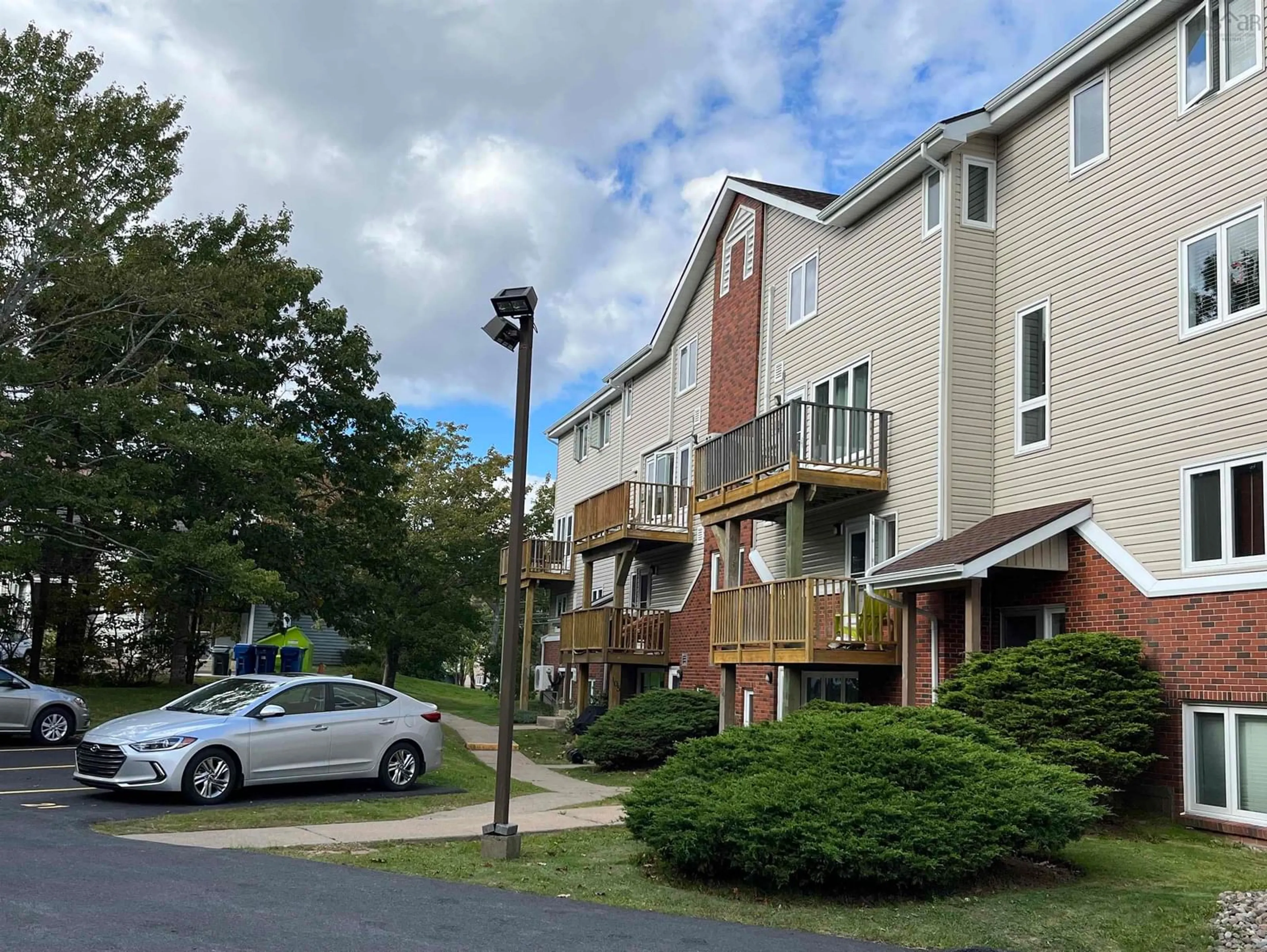 A pic from exterior of the house or condo, the street view for 158 Farnham Gate Rd #205, Clayton Park Nova Scotia B3M 3V8