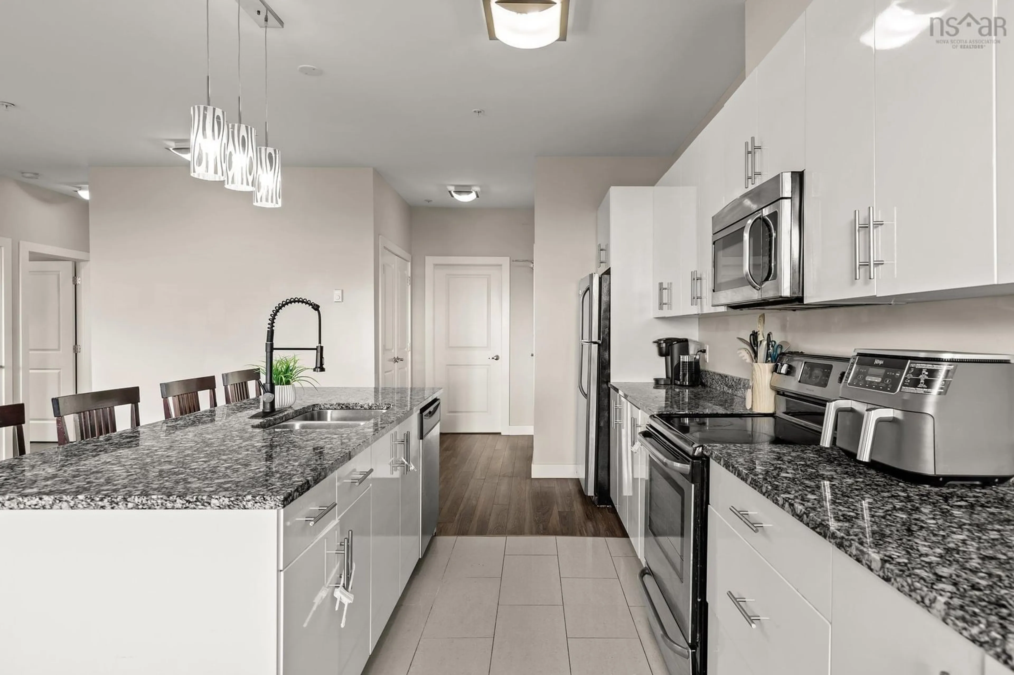 Open concept kitchen for 119 Walker Ave #303, Lower Sackville Nova Scotia B4C 0C5