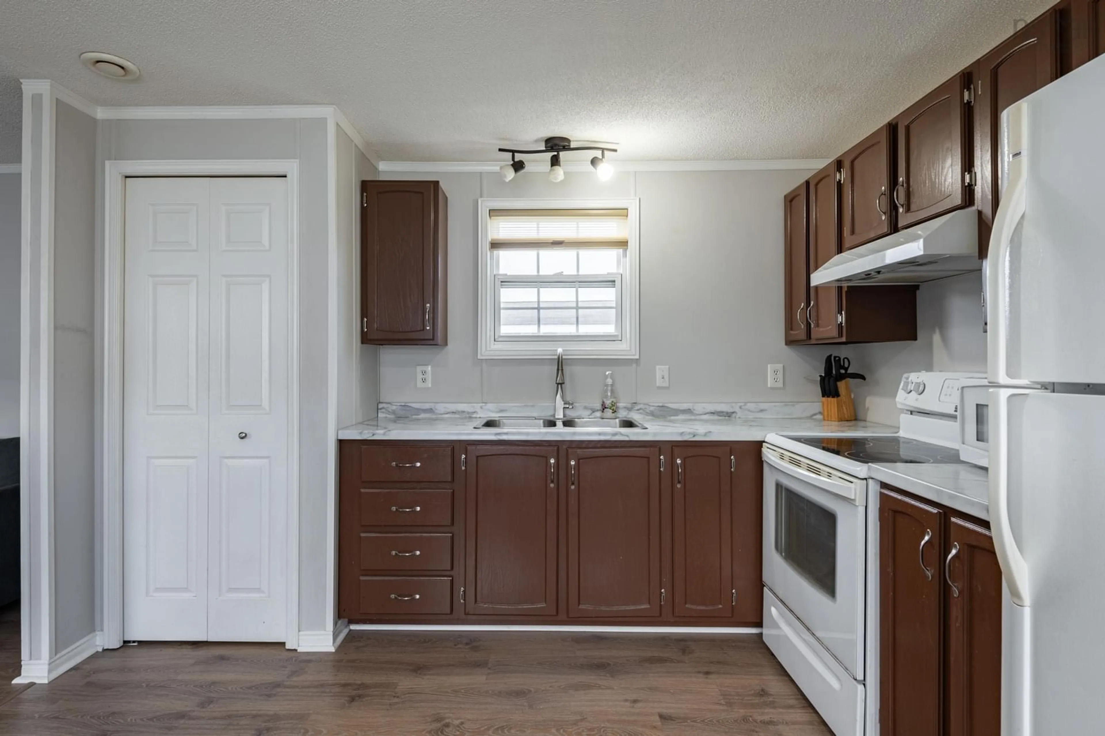 Standard kitchen, wood floors, cottage for 8 Owen Ave, South Uniacke Nova Scotia B0N 1Z0