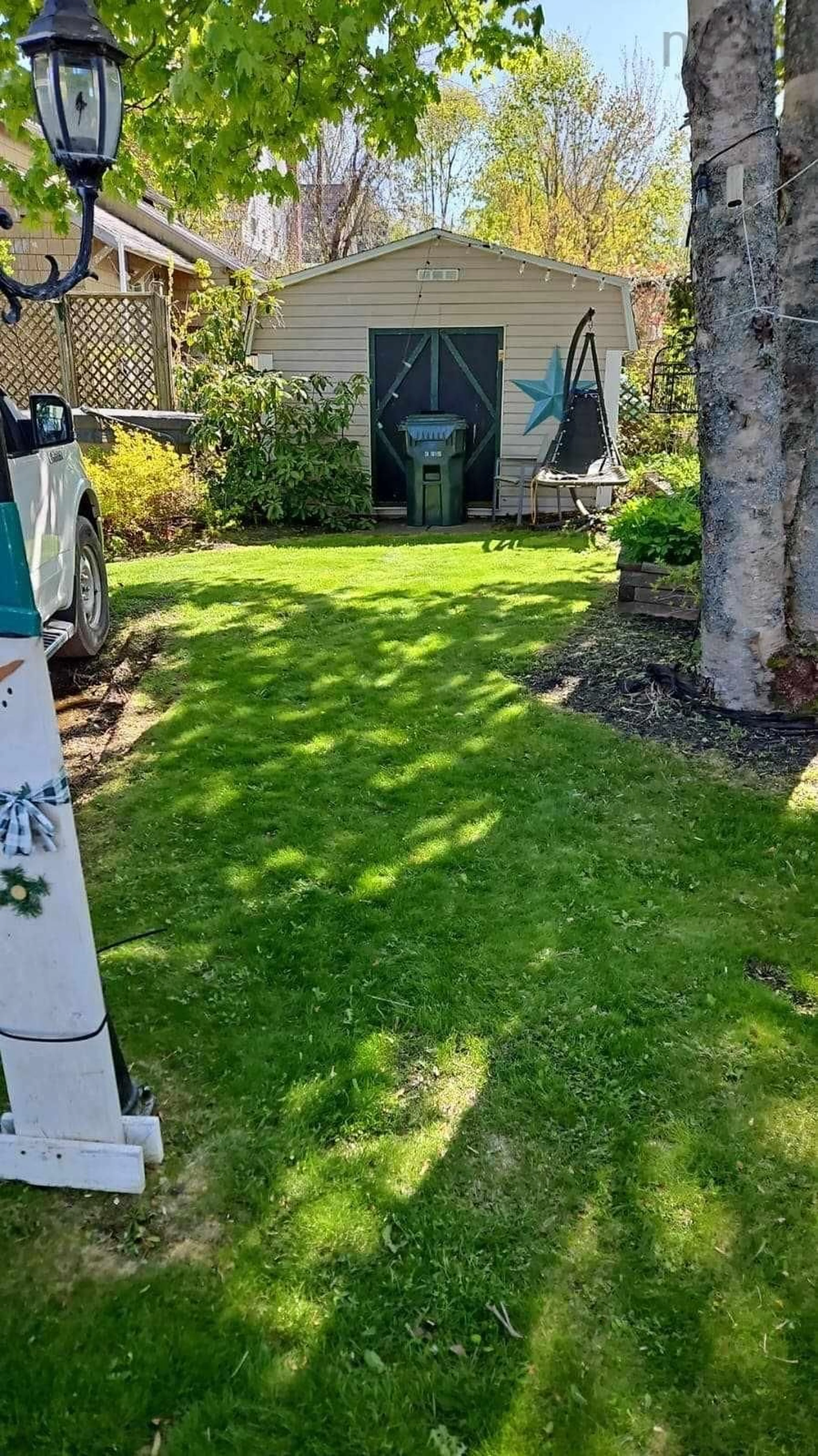 Patio, the fenced backyard for 31 Royal Ave, Sydney Nova Scotia B1P 4M1