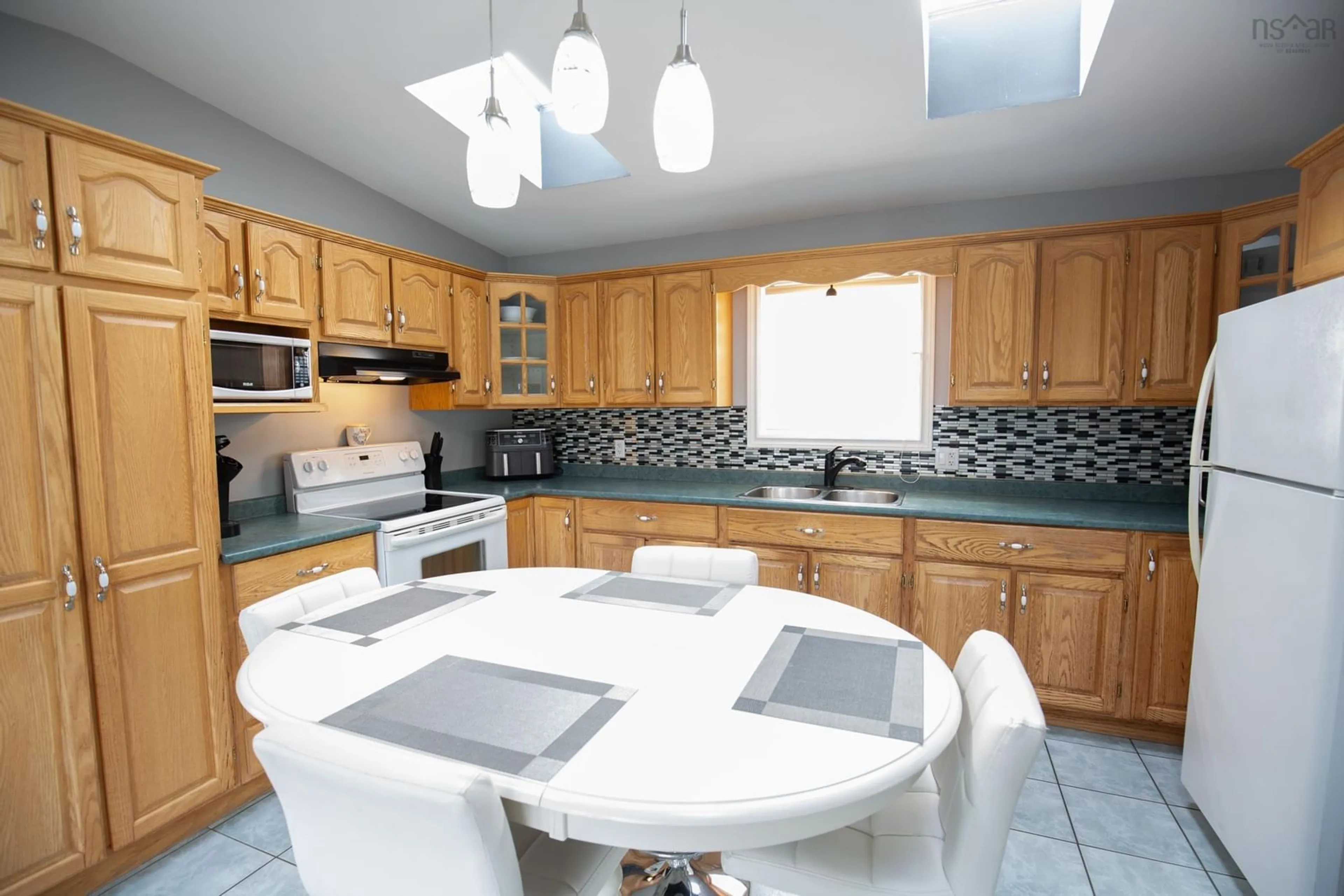 Standard kitchen, wood floors, cottage for 8 Terris St, Springhill Nova Scotia B0M 1X0