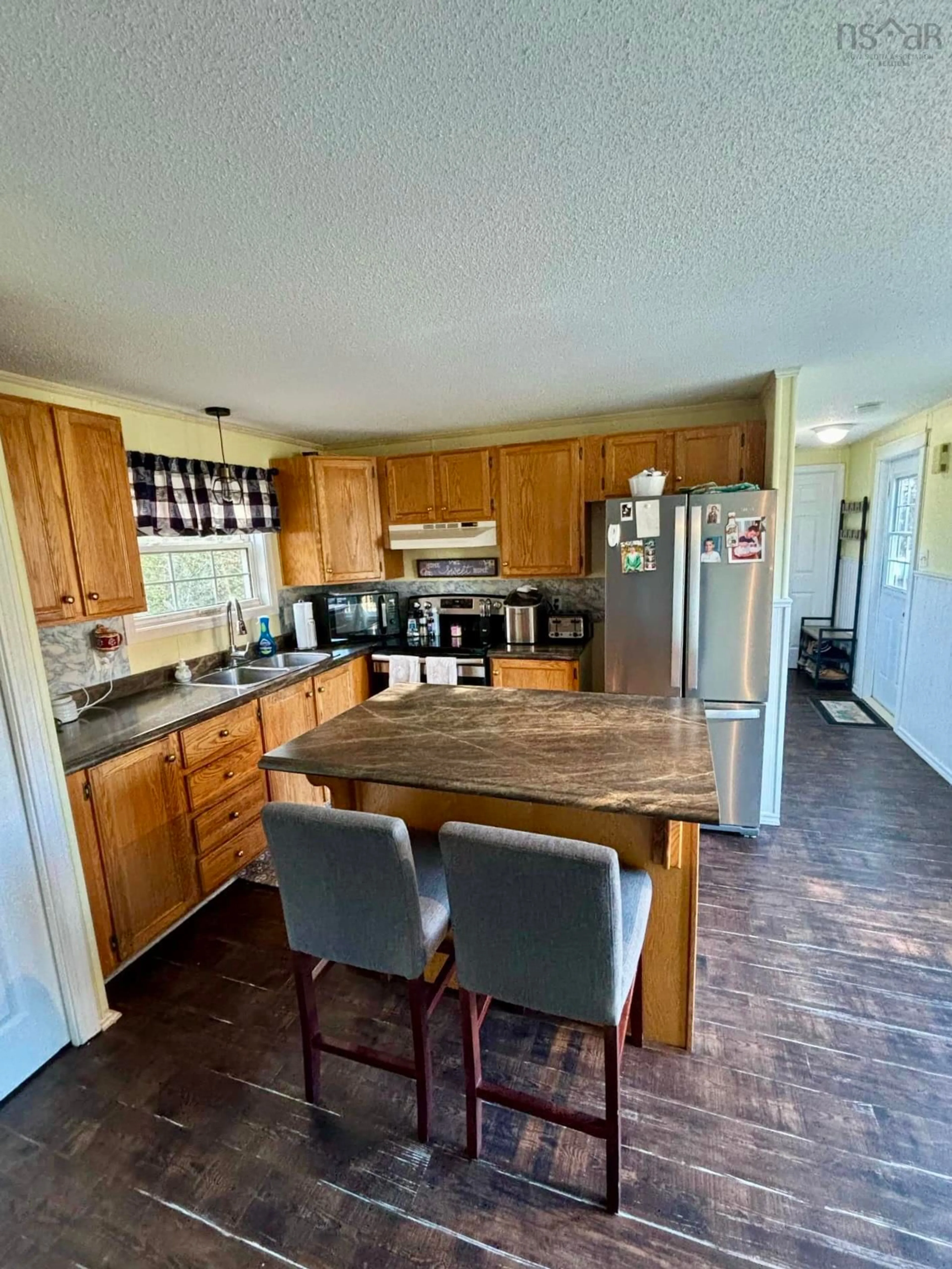 Open concept kitchen for 797 Oak Park Rd, Oak Park Nova Scotia B0W 1E0