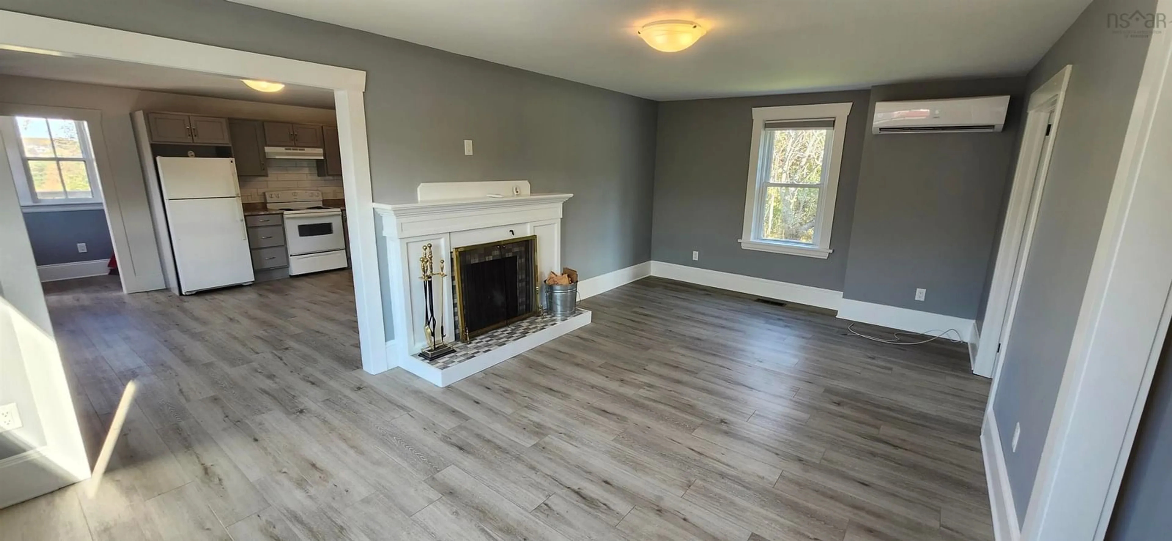 A pic of a room, wood floors for 1882 Kings Rd, Sydney River Nova Scotia B1L 1C5