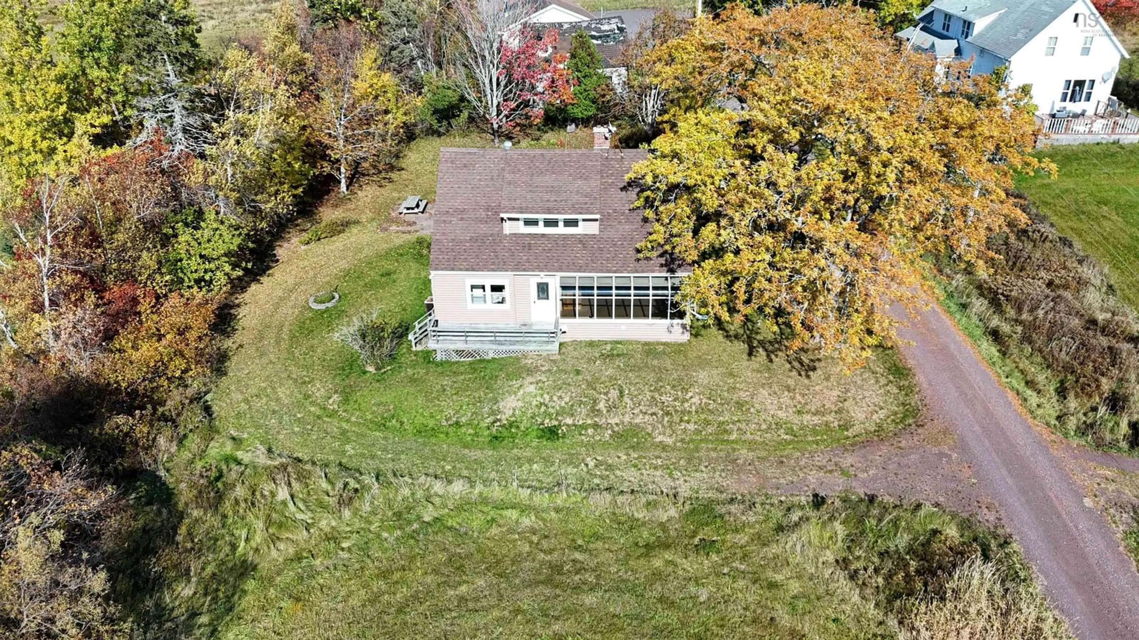 A pic from exterior of the house or condo, the fenced backyard for 114 Cove Rd, Waldegrave Nova Scotia B0K 1V0