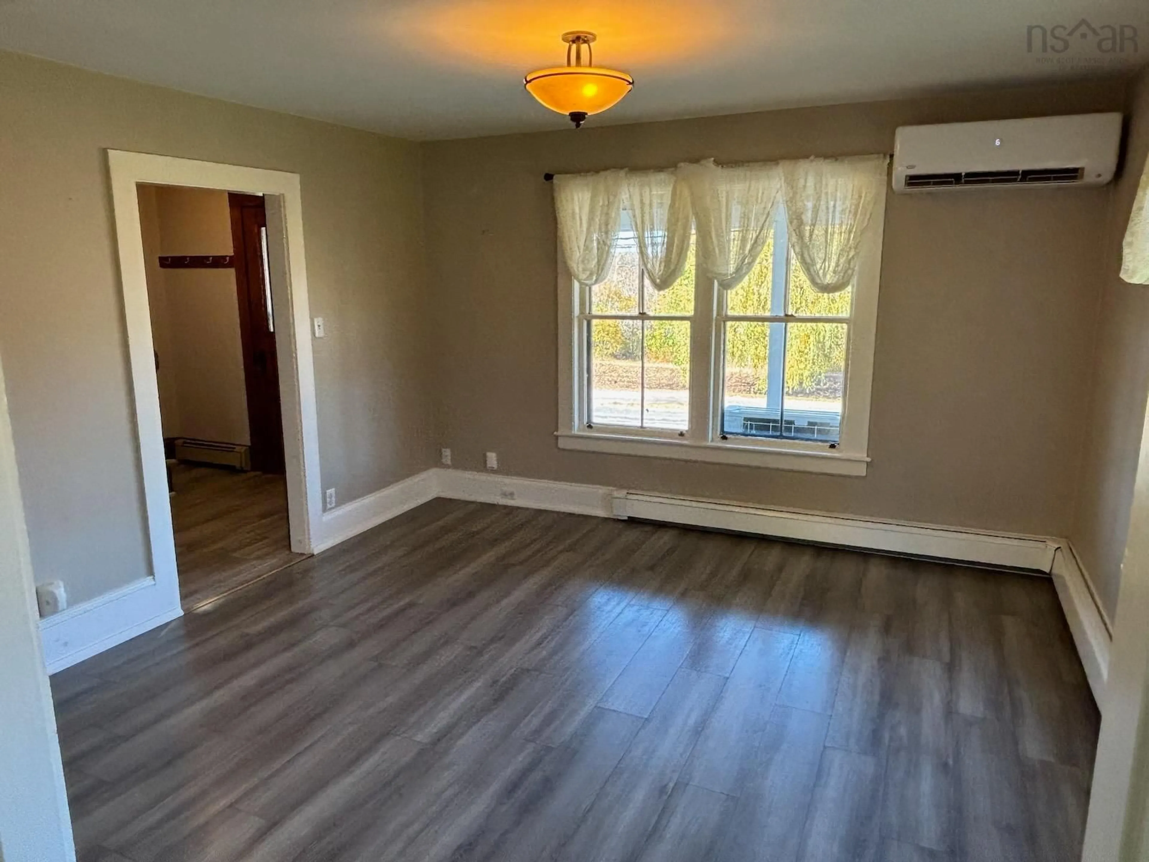 A pic of a room, wood floors for 210 Highway 1, Smiths Cove Nova Scotia B0S 1S0