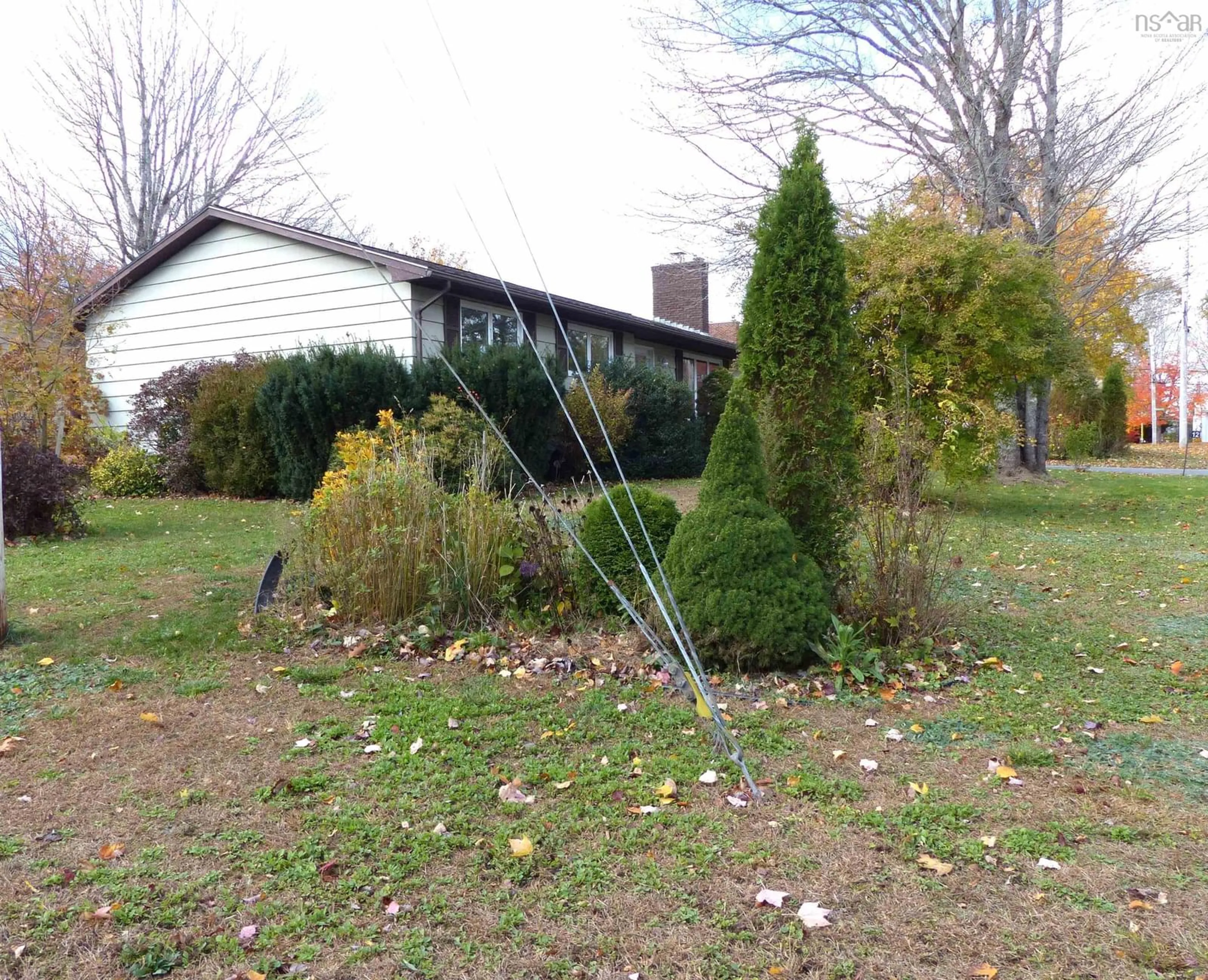 Frontside or backside of a home, the fenced backyard for 12 Medway St, Bridgewater Nova Scotia B4V 1J9