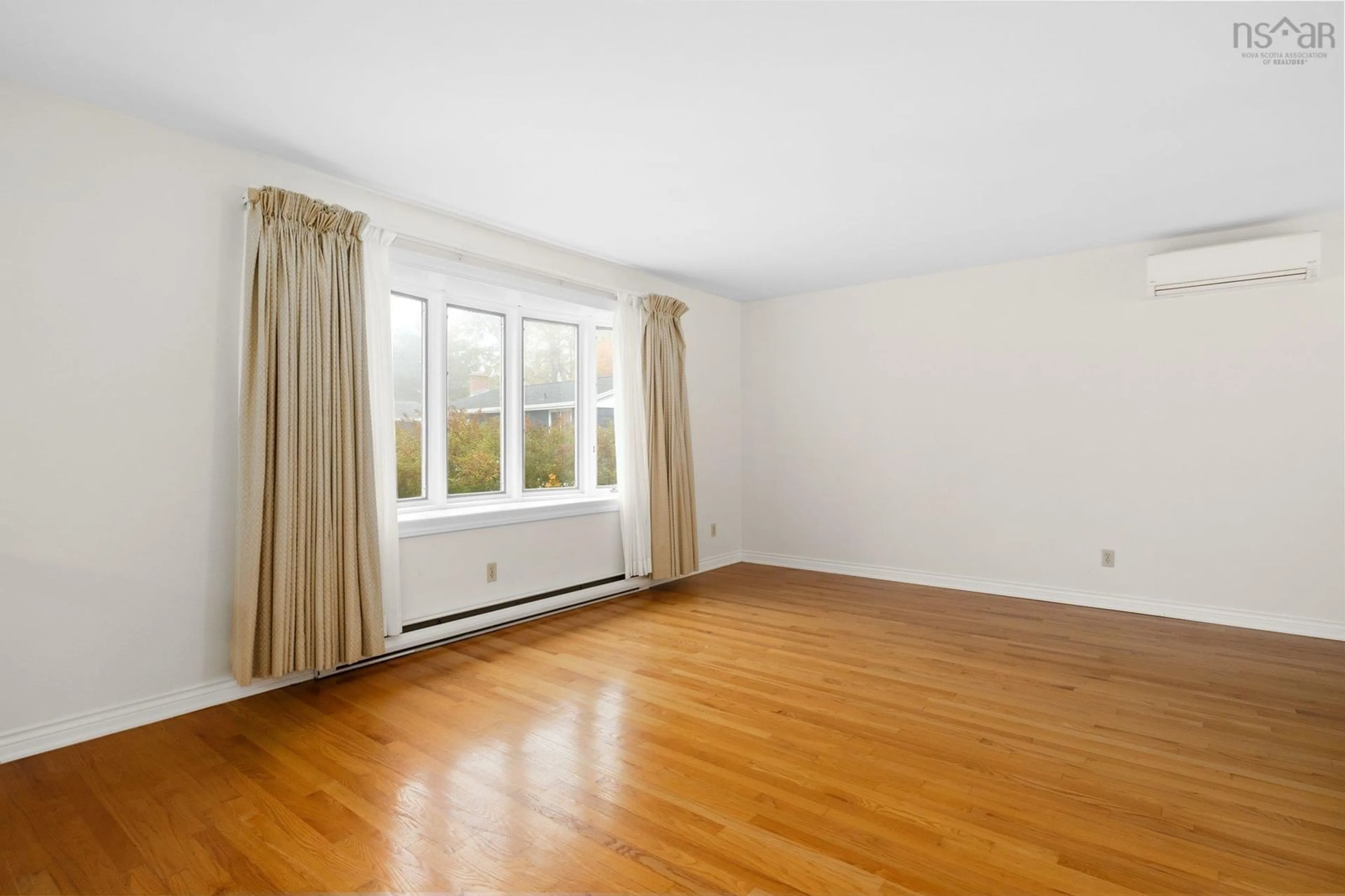 A pic of a room, wood floors for 48 Skeena St, Dartmouth Nova Scotia B2W 4H9