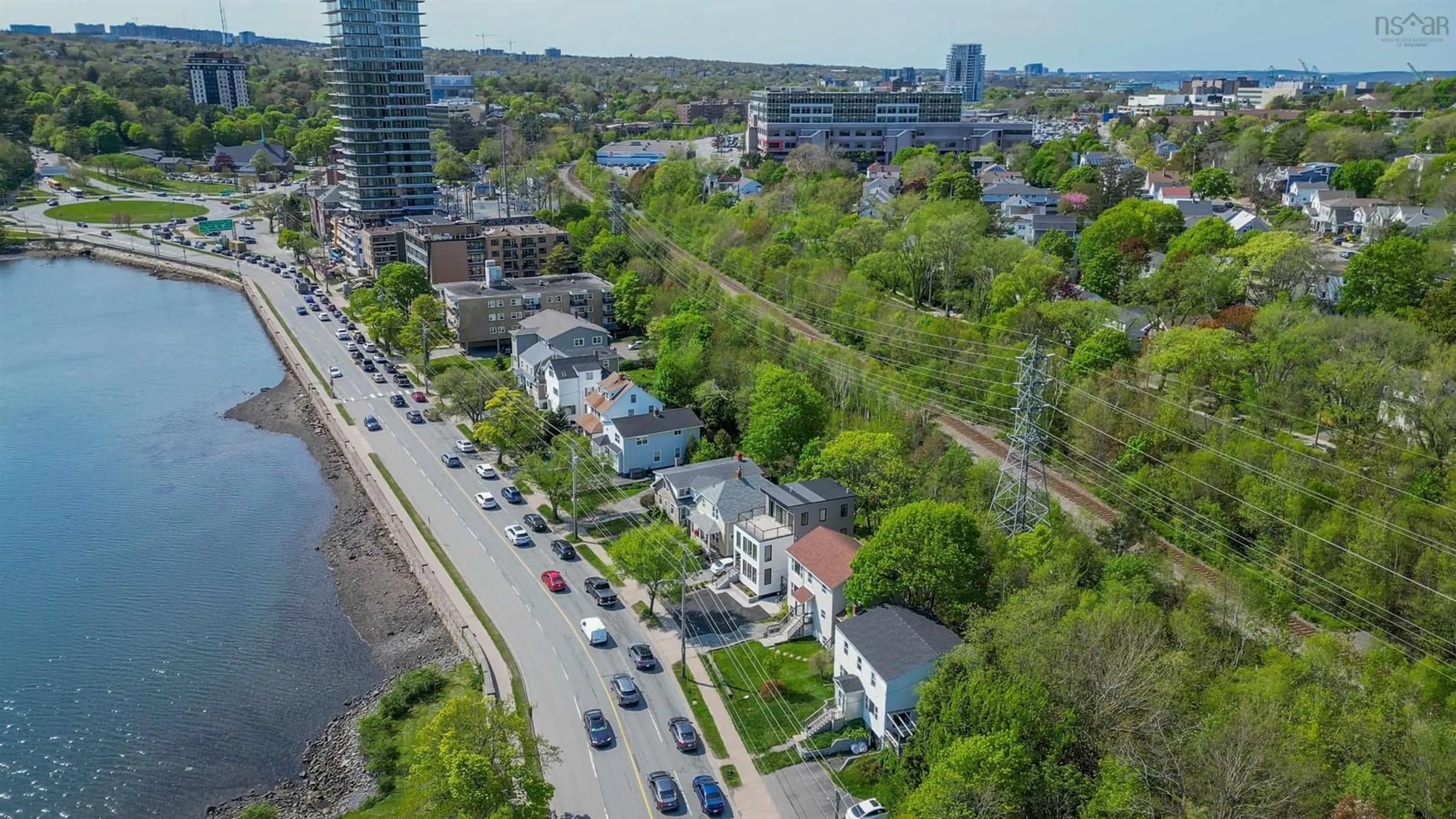 A pic from exterior of the house or condo, the street view for 7077 Quinpool Rd, Halifax Nova Scotia B3L 1C7