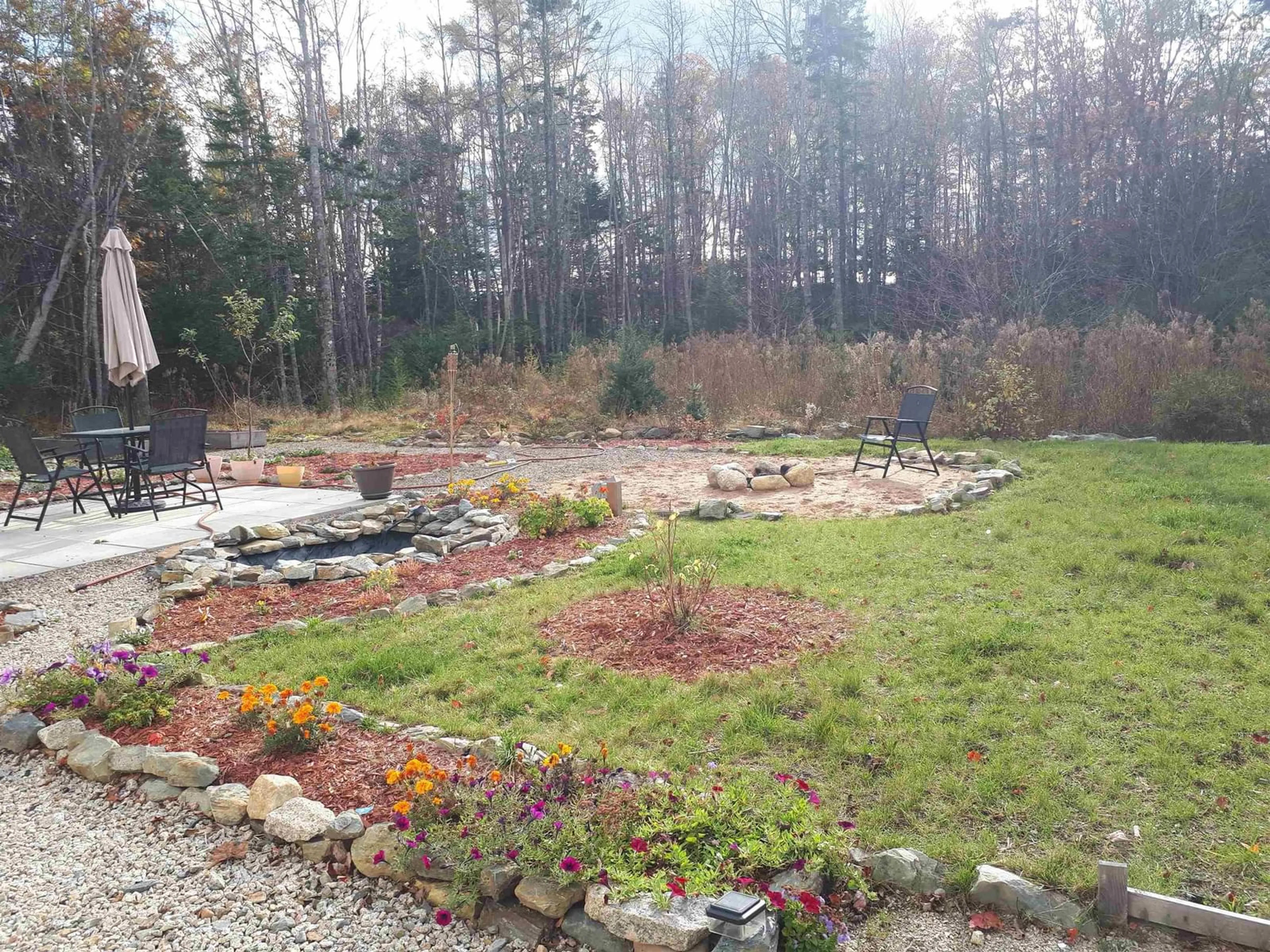 Patio, the fenced backyard for 82 Rum Runners Lane #3, Martins Point Nova Scotia B0J 2E0