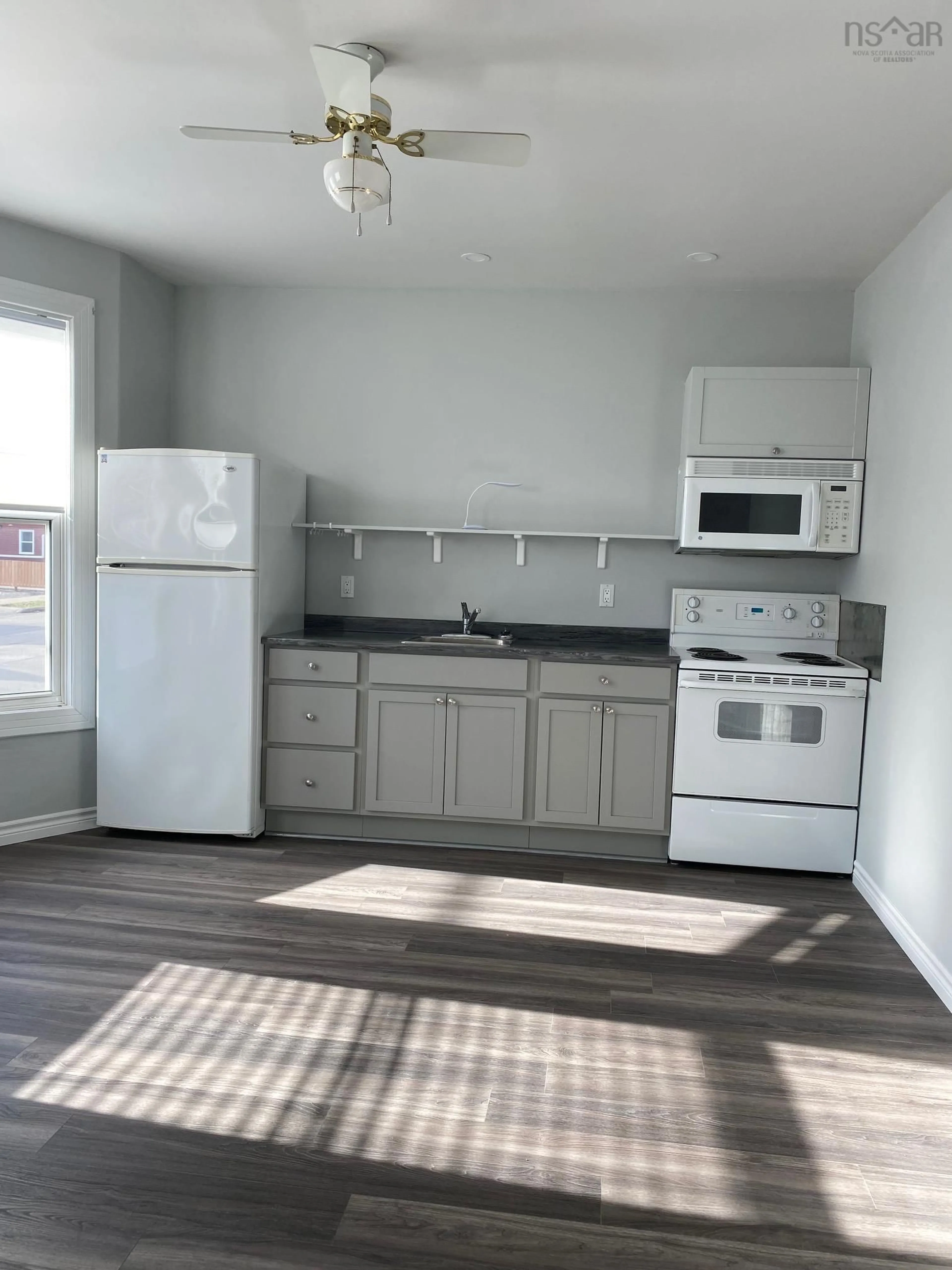 Standard kitchen, wood floors, cottage for 263 Bentinck St, Sydney Nova Scotia B1P 1G8