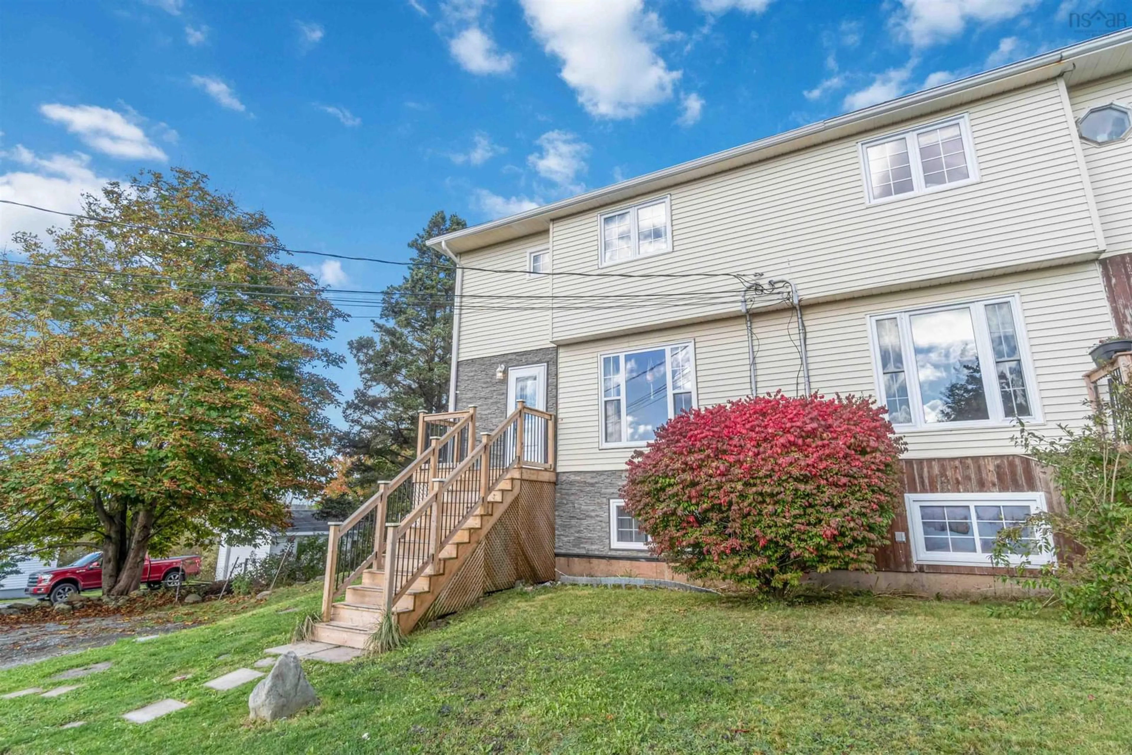 A pic from exterior of the house or condo, the fenced backyard for 10 Millers Rd, Eastern Passage Nova Scotia B0J 3A0