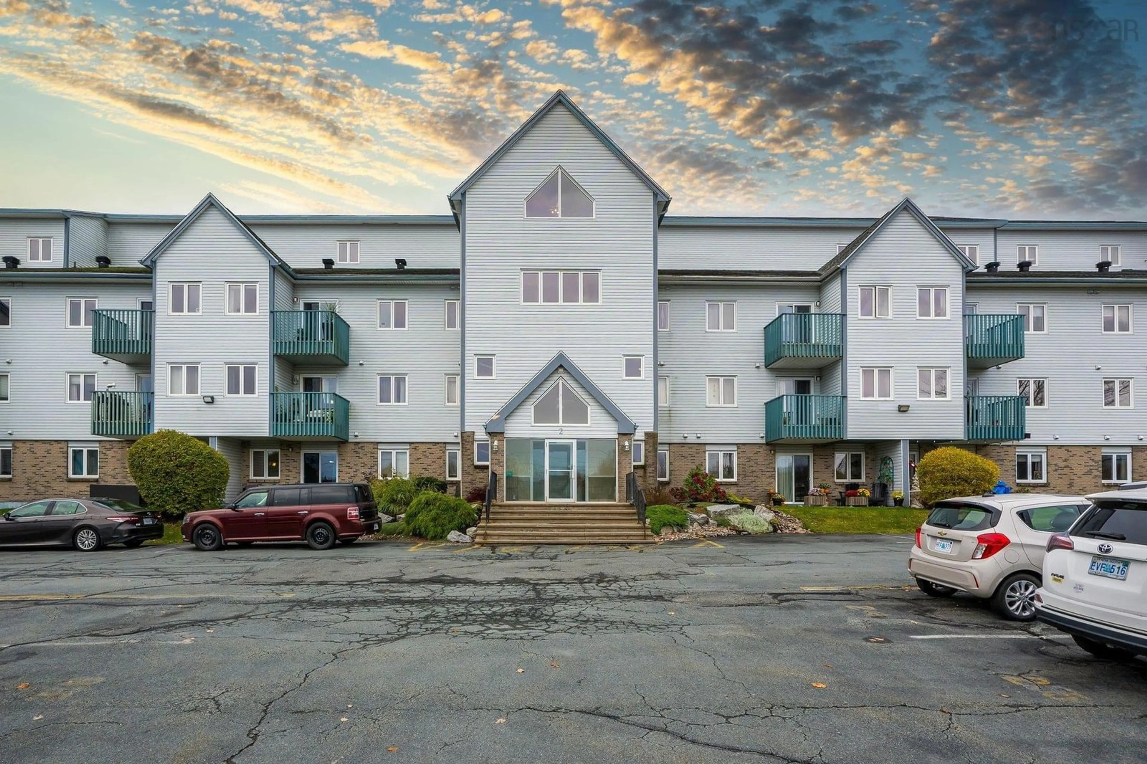 A pic from exterior of the house or condo, the front or back of building for 2 Lombardy Lane #211, Dartmouth Nova Scotia B2X 3E4