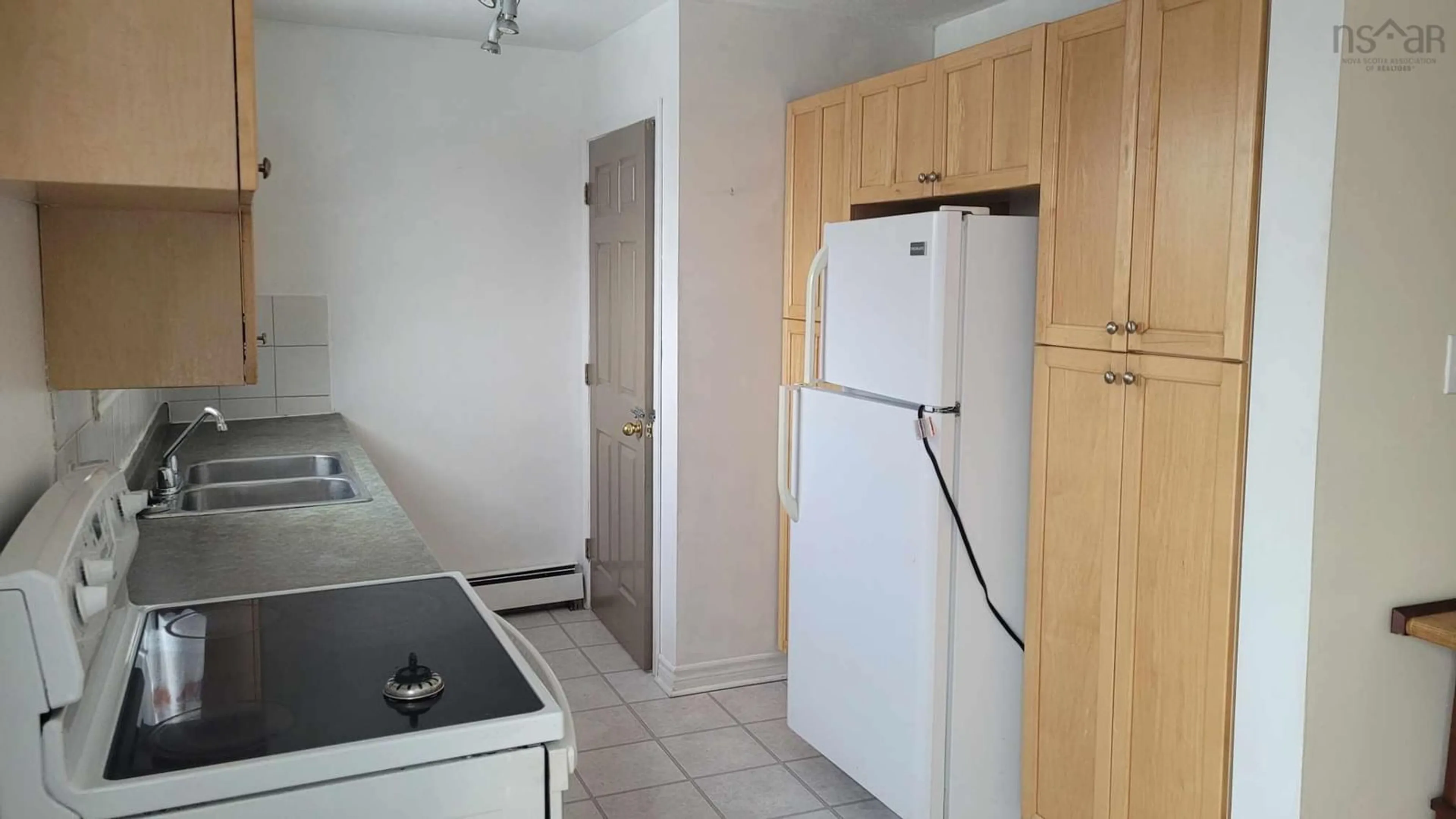 Standard kitchen, not visible floor, cottage for 779 Eskasoni Rd, Northside East Bay Nova Scotia B1J 1C2