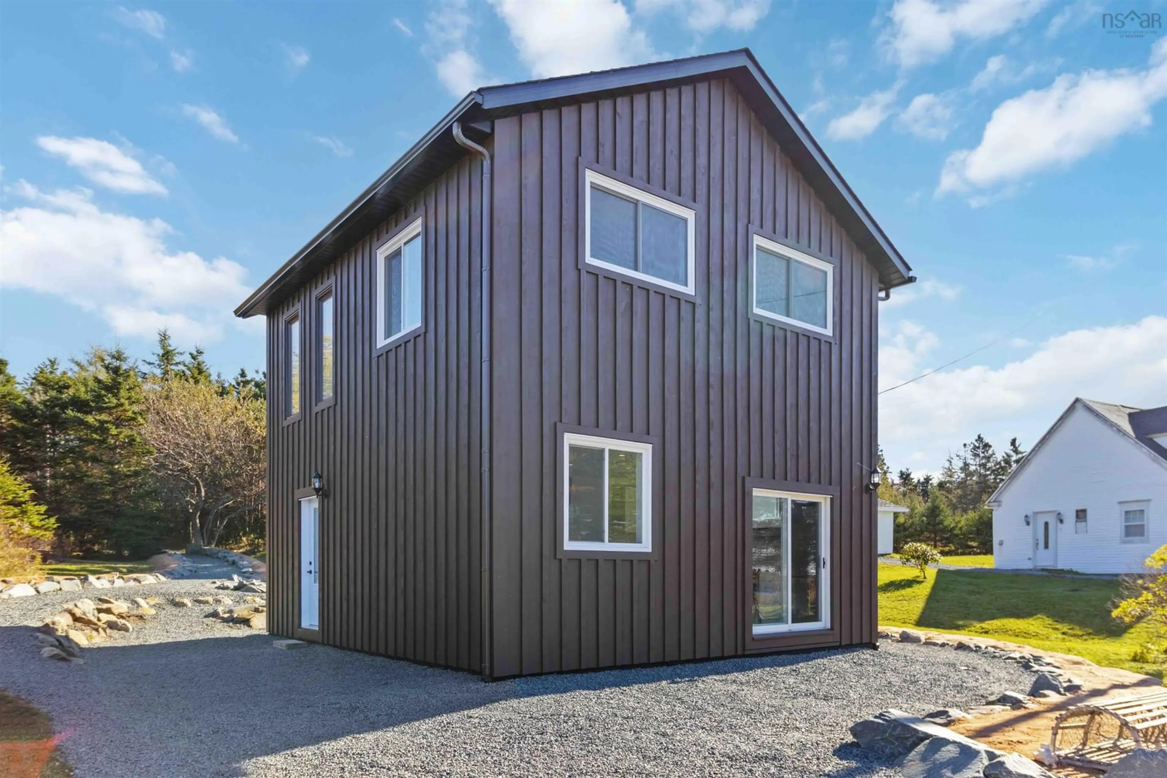 Home with vinyl exterior material for 377 East Chezzetcook Rd, East Chezzetcook Nova Scotia B0J 1N0