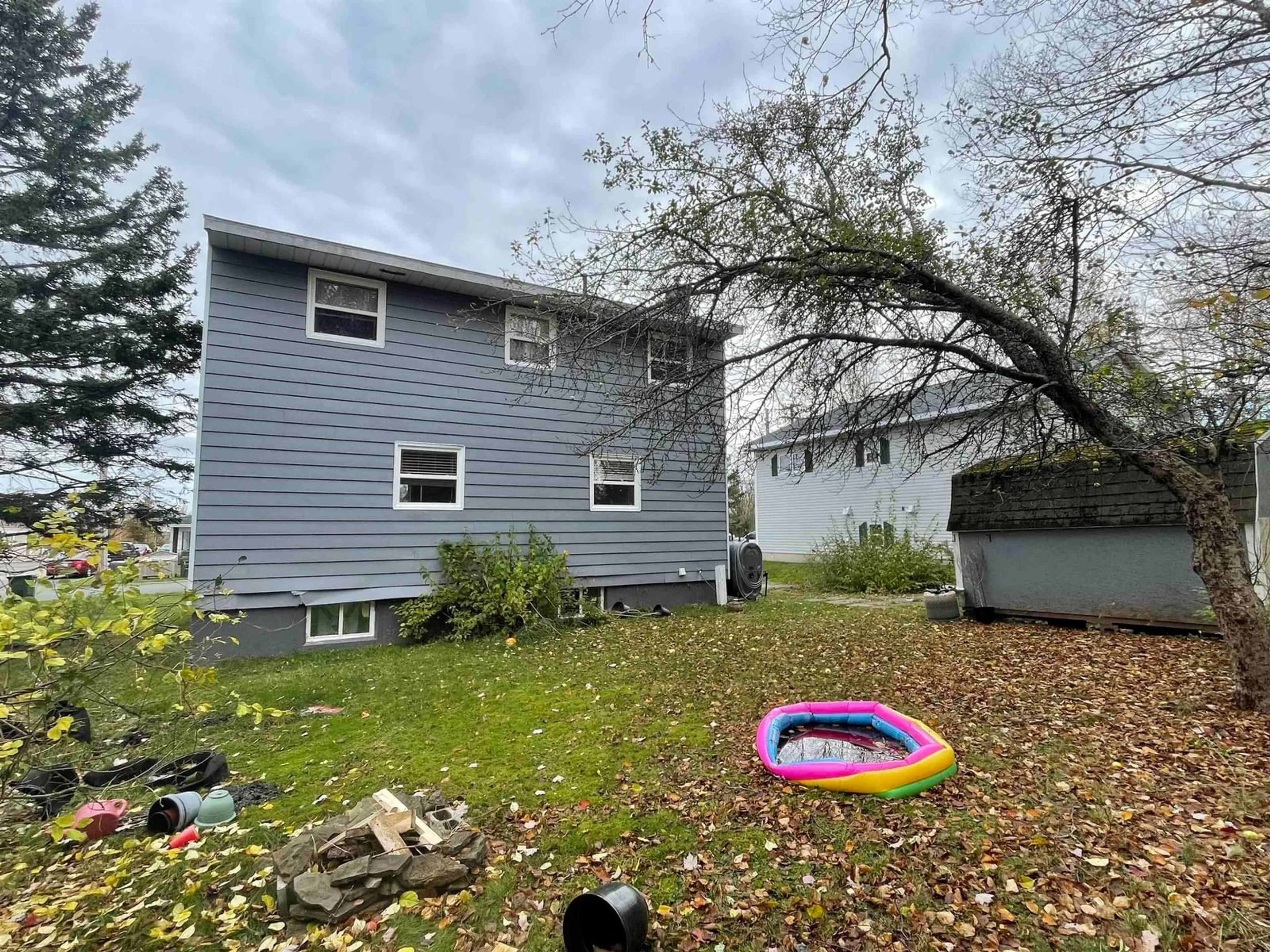 Frontside or backside of a home, the fenced backyard for 22 Xavier Dr, Sydney Nova Scotia B1S 2R8