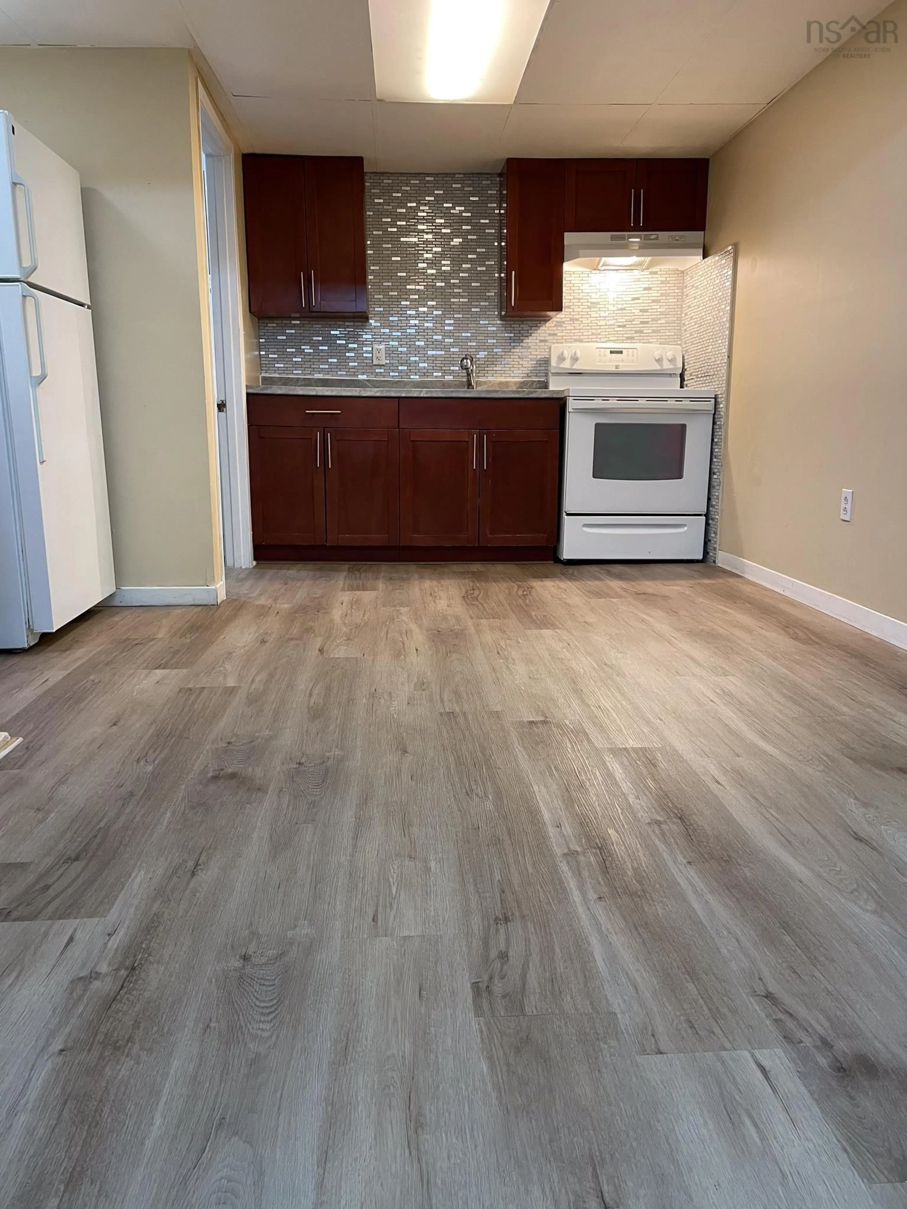 A pic of a room, wood floors for 22 Xavier Dr, Sydney Nova Scotia B1S 2R8