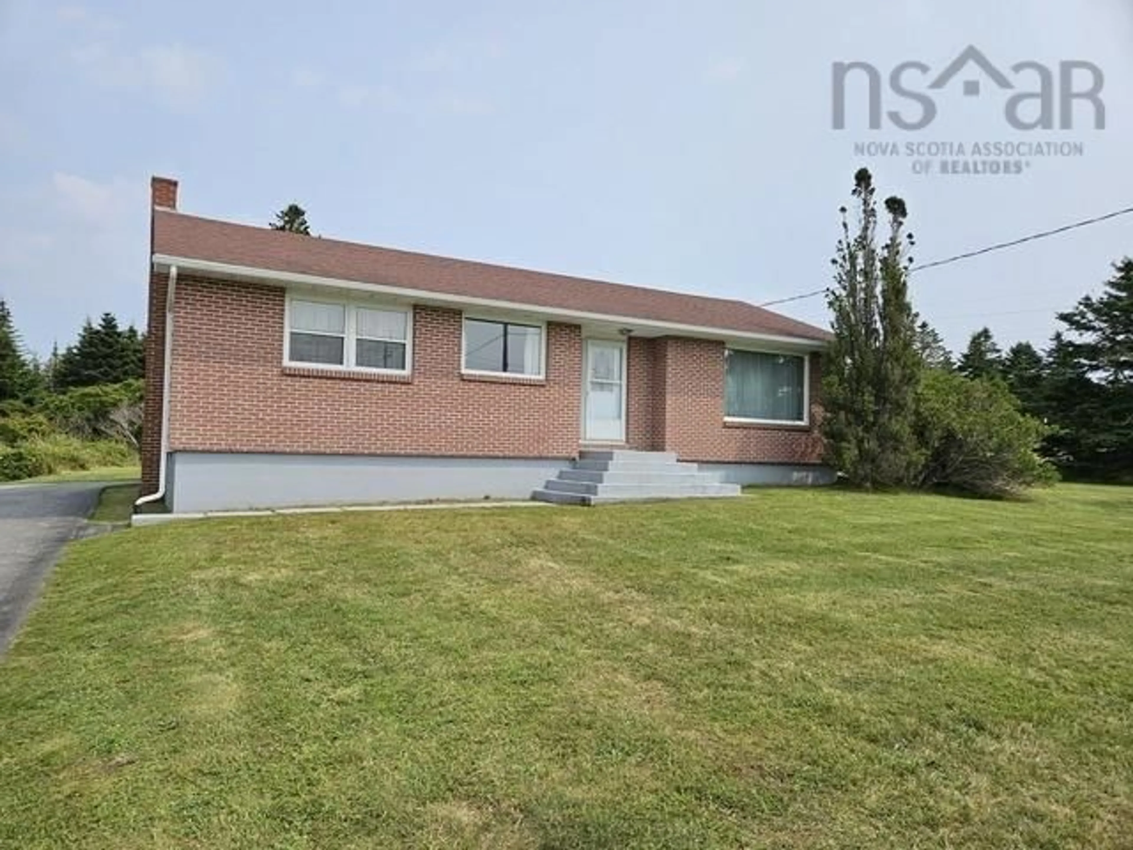 Frontside or backside of a home, the street view for 653 Highway 3, North East Point Nova Scotia B0W 2P0